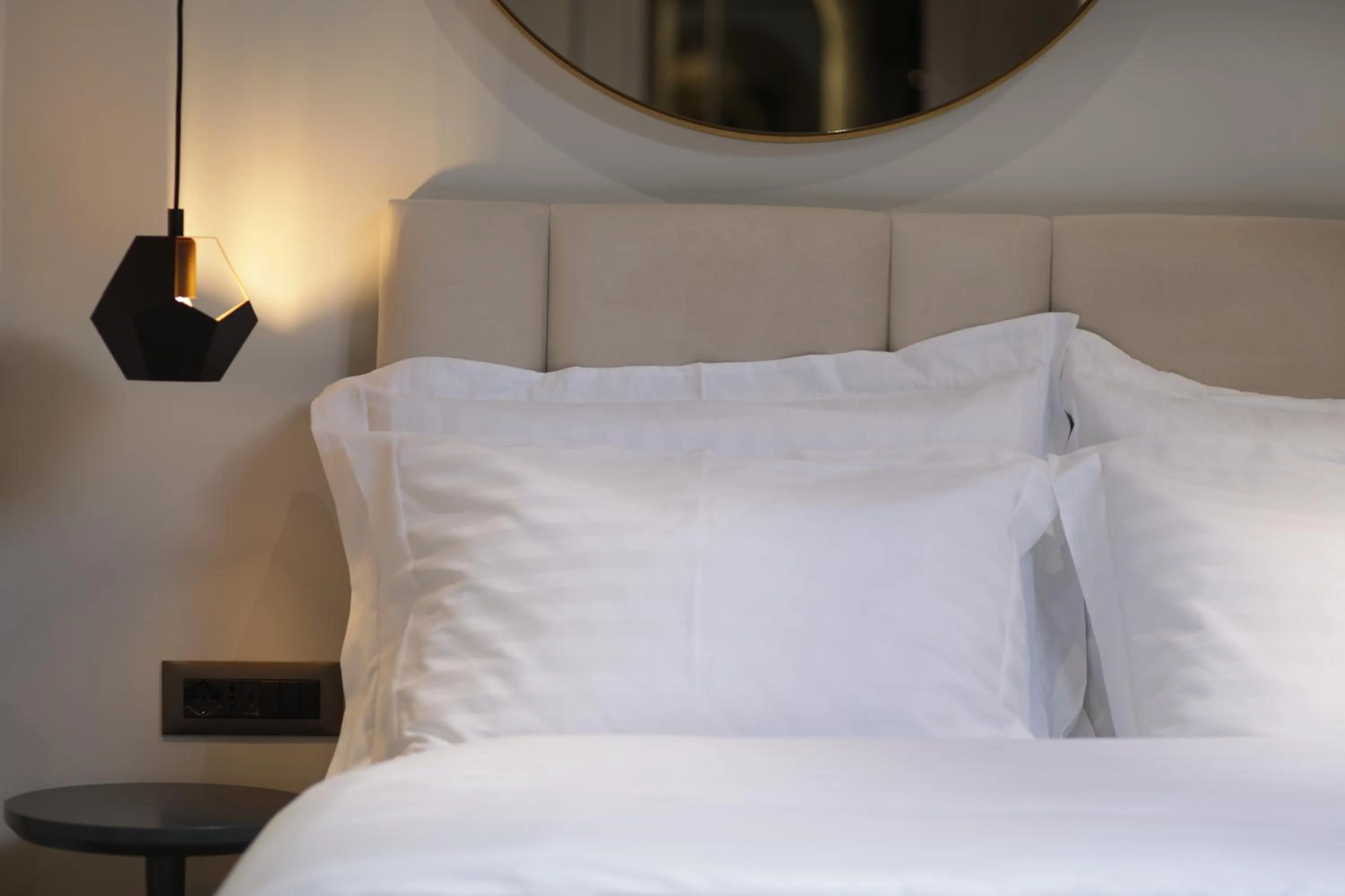 Bed in Gremmy Boutique Hotel