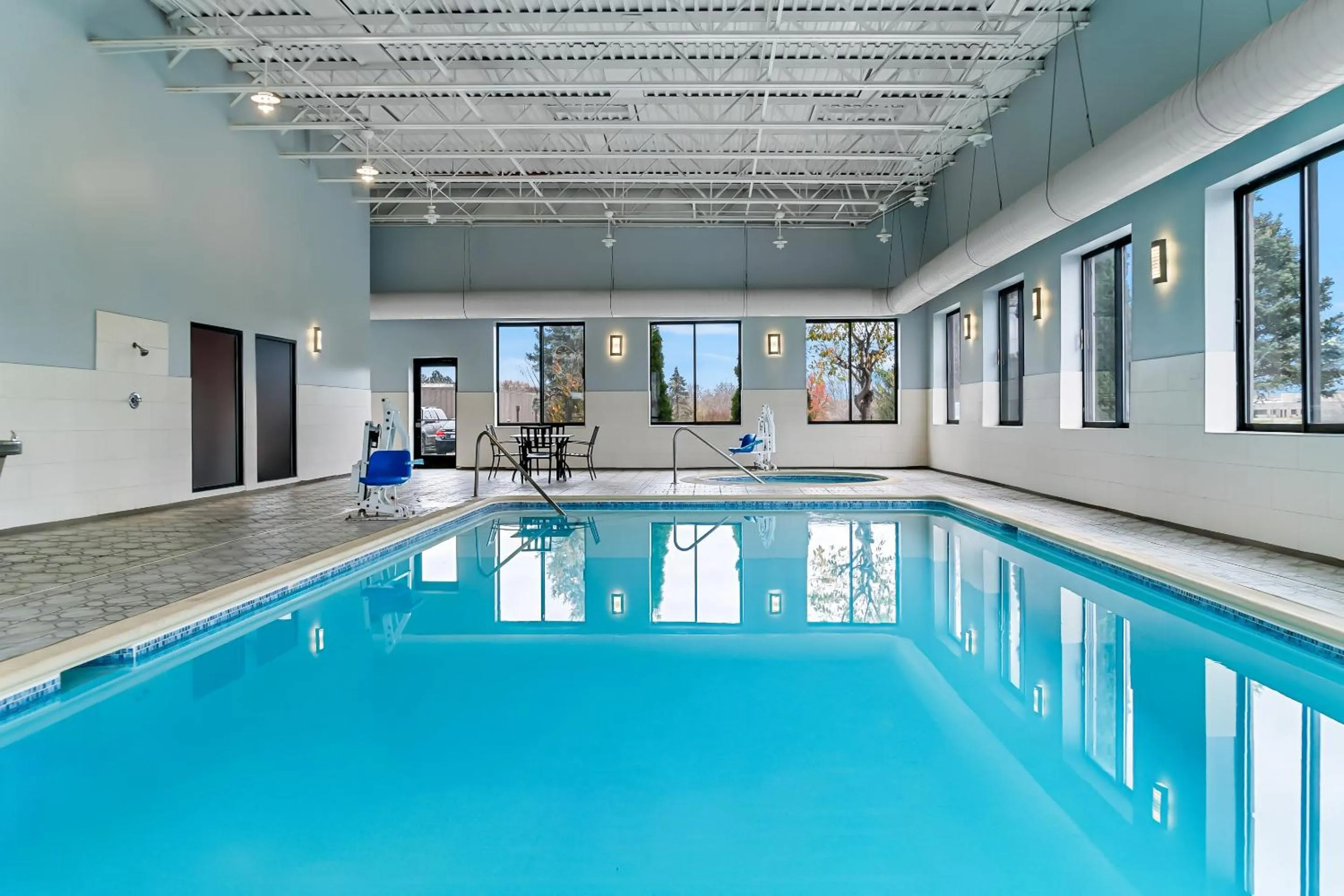 Swimming pool in HomeTowne Studios by Red Roof Flint