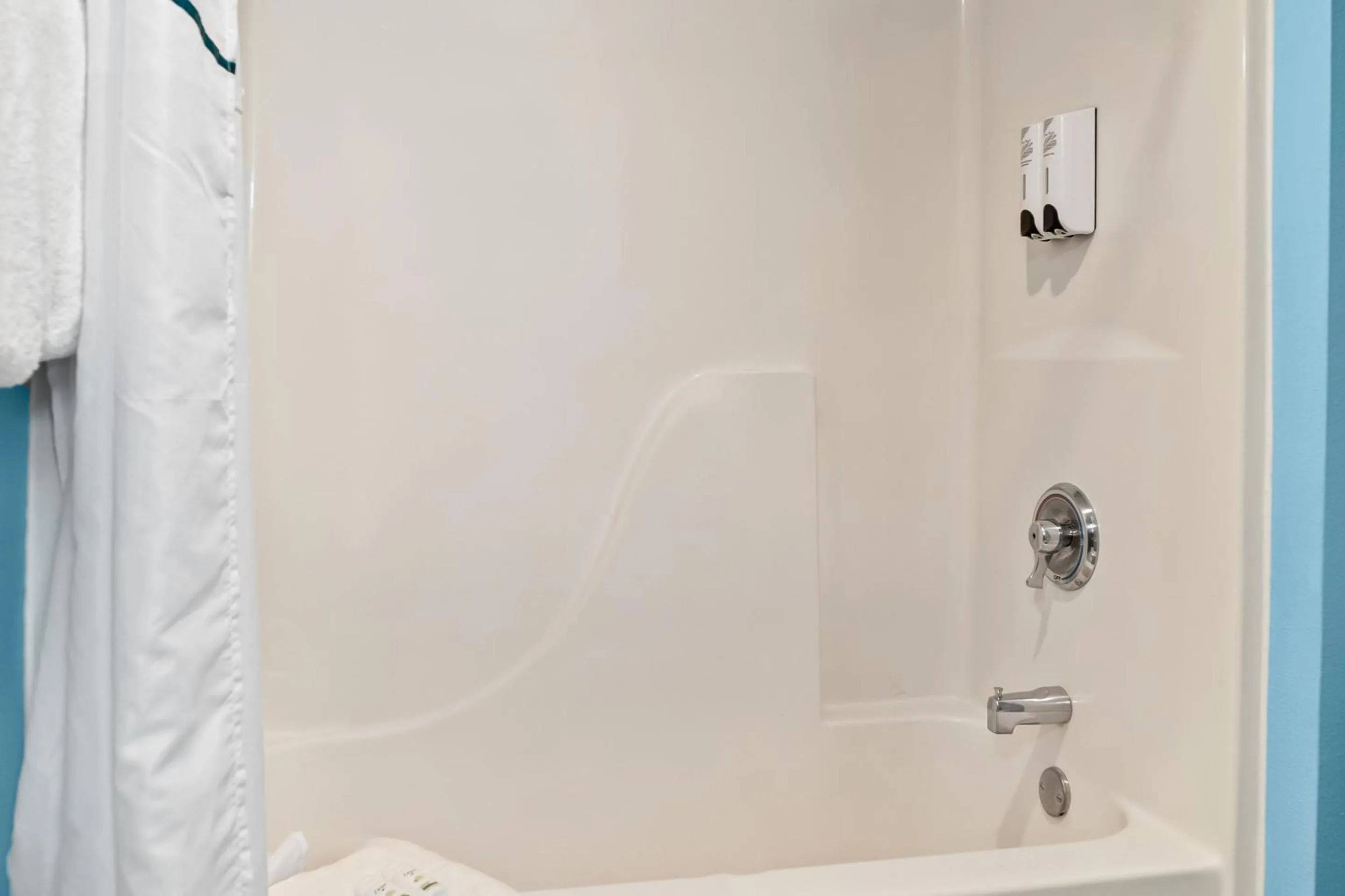 Bathroom in HomeTowne Studios by Red Roof Flint