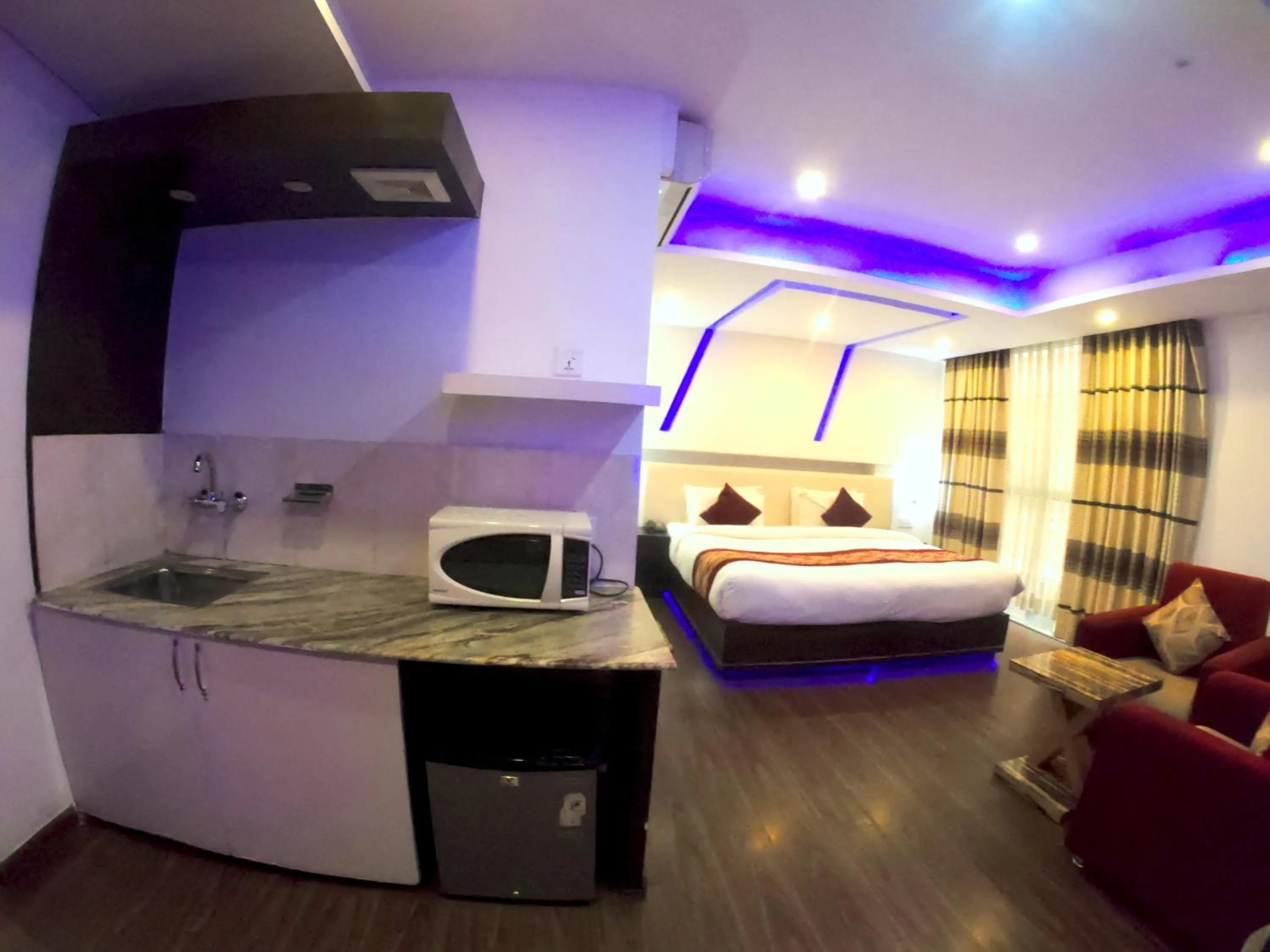 Kitchen or kitchenette, Bed in Avataar Kathmandu Hotel