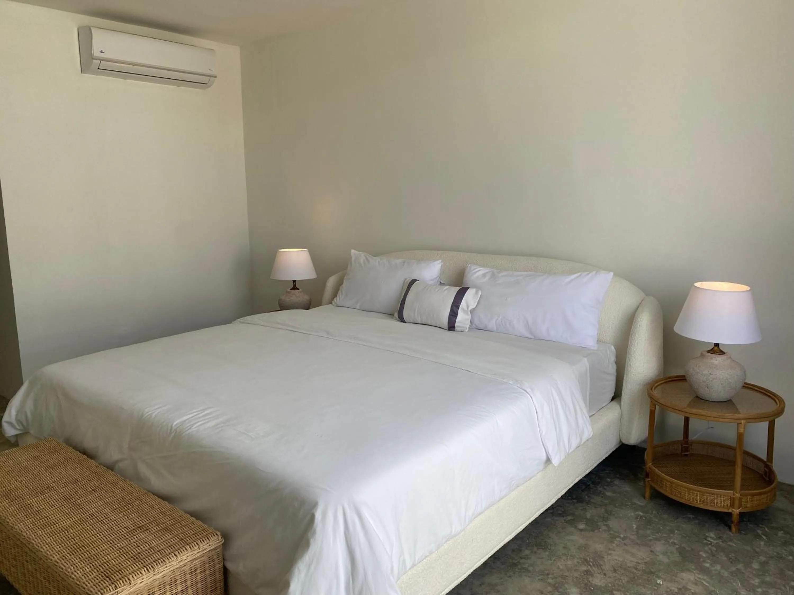 Bed in The Palm Bay Club Lodge