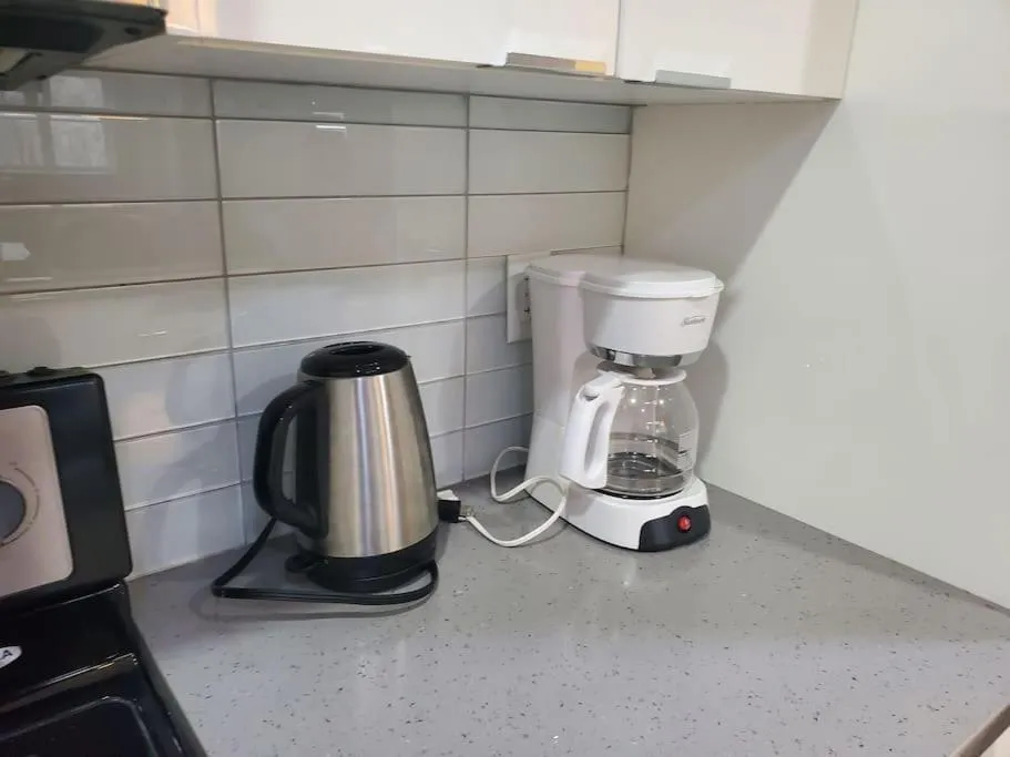 Coffee/tea facilities in Stunning 1 bedroom condo in Calgary with riverview