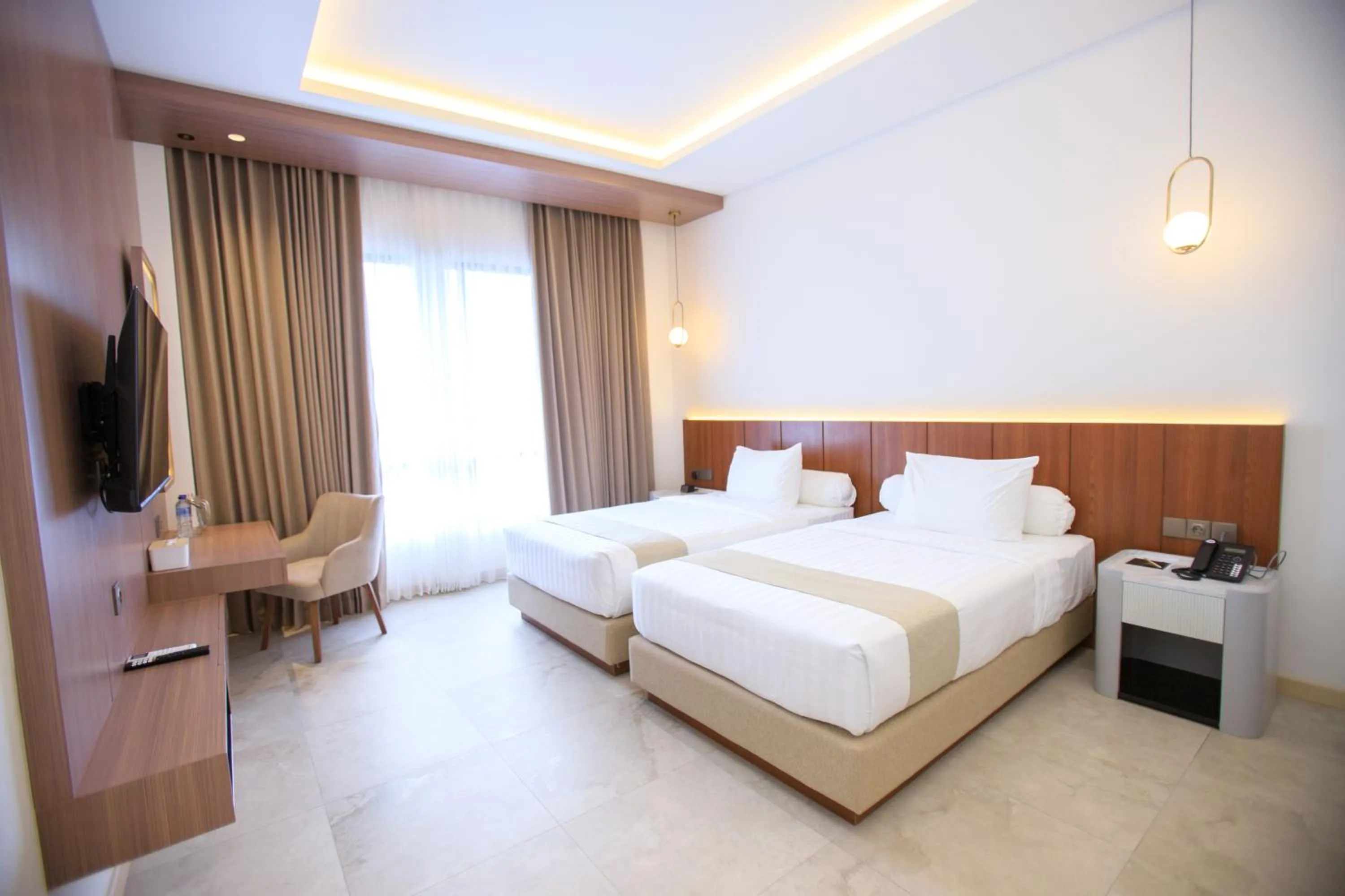 Bed in Two K Azana Style Hotel Bengkulu