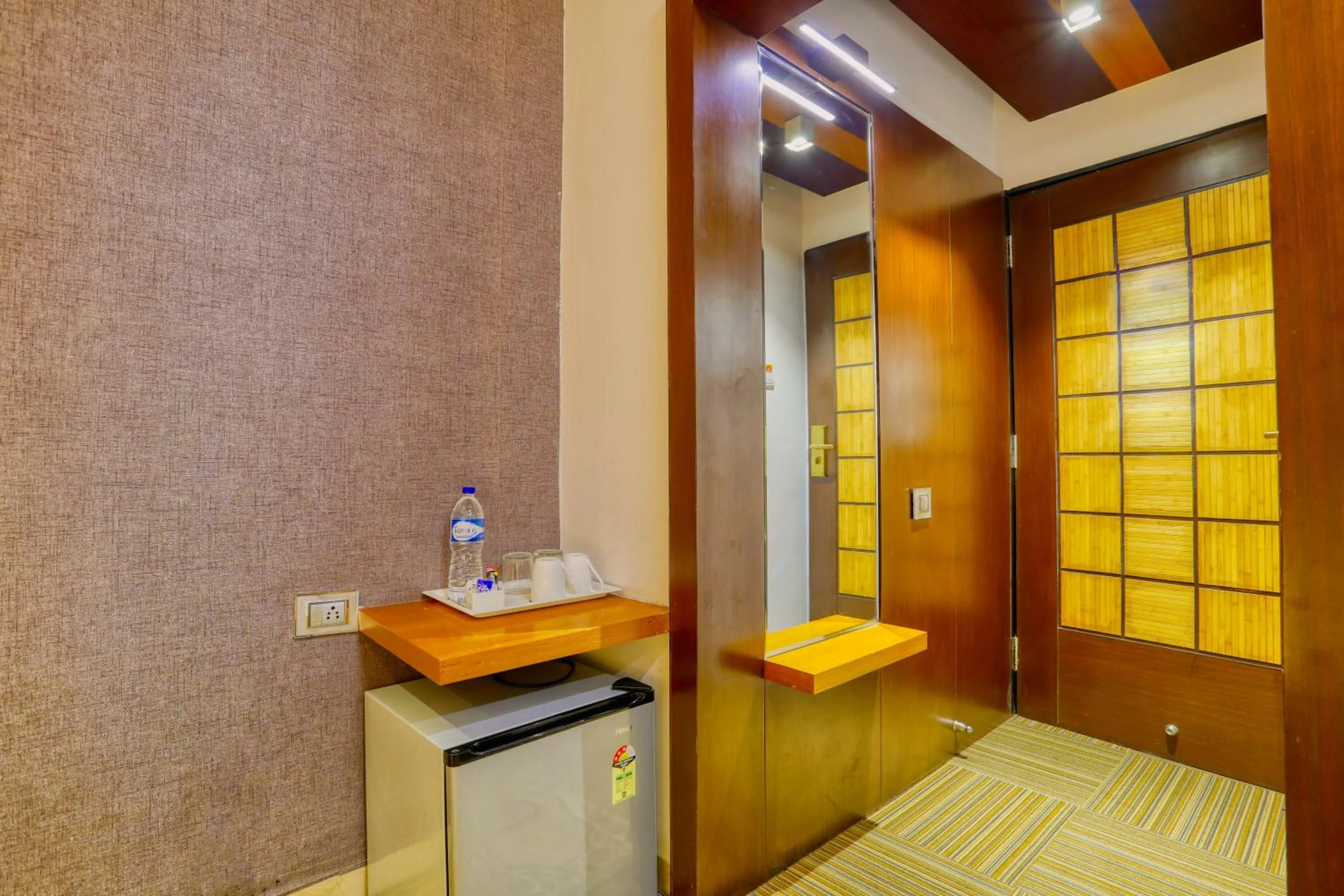 Bedroom in The Ashoka Hotel