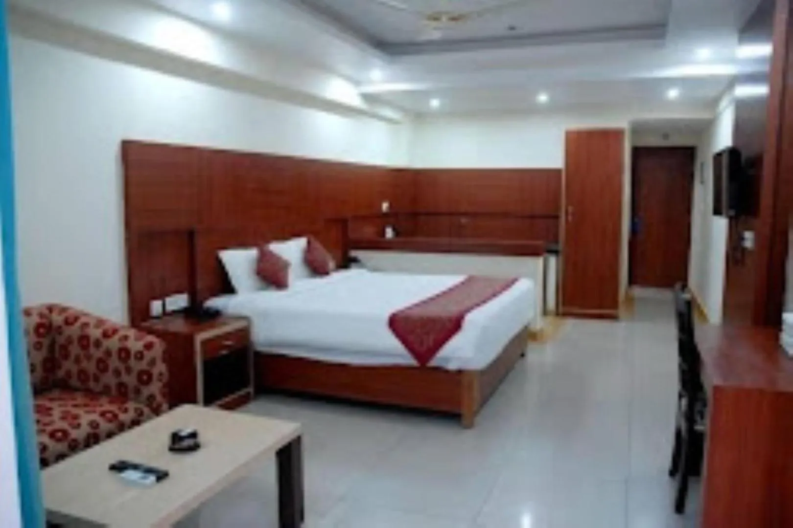 Bed in Blue Lily Beach Resort