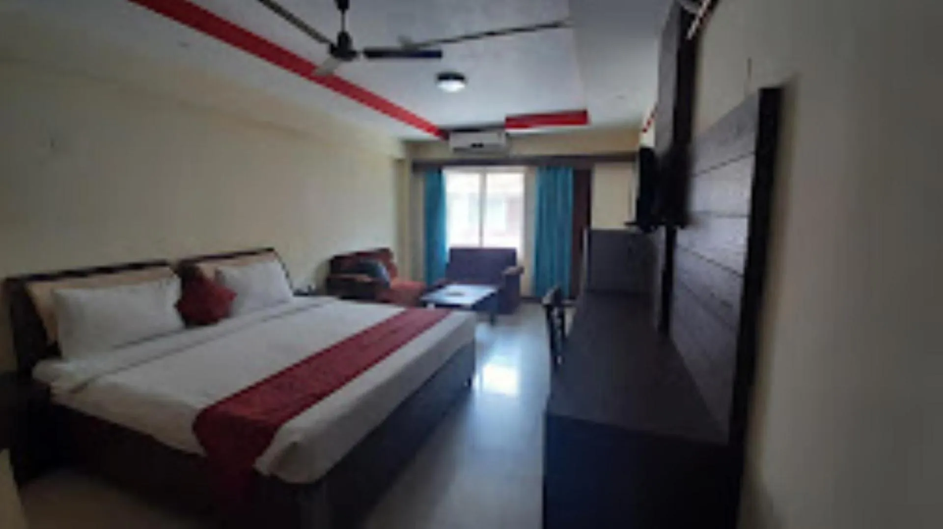 Bed in Blue Lily Beach Resort