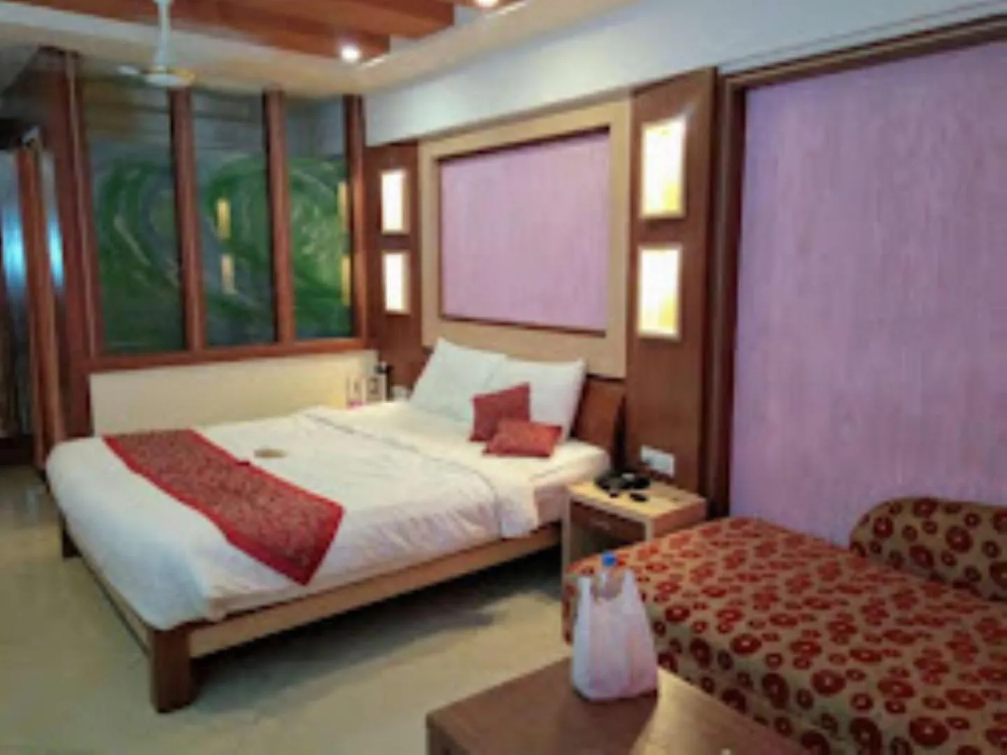 Bed in Blue Lily Beach Resort