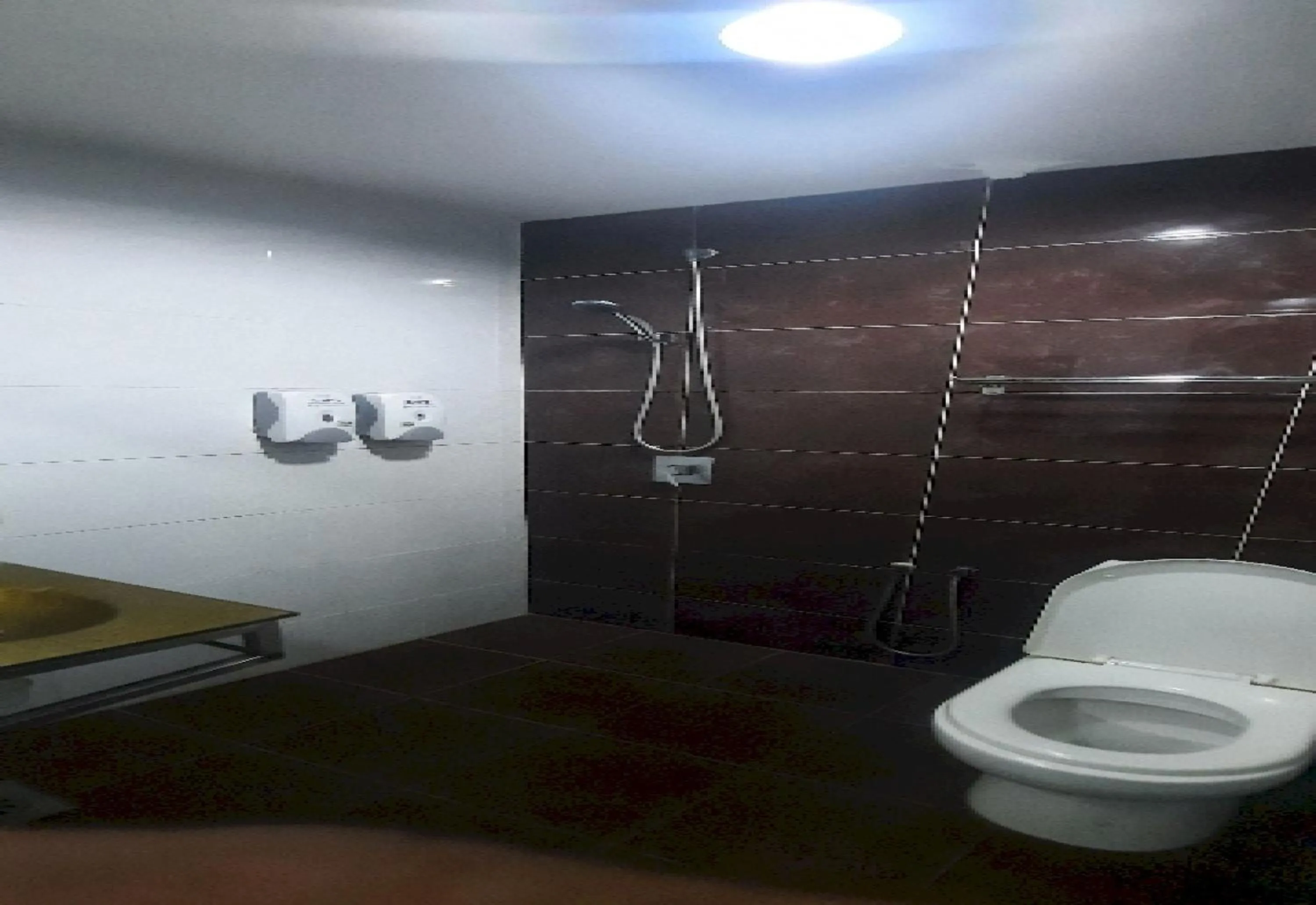 Bathroom in Super OYO 90724 Rg Hotel