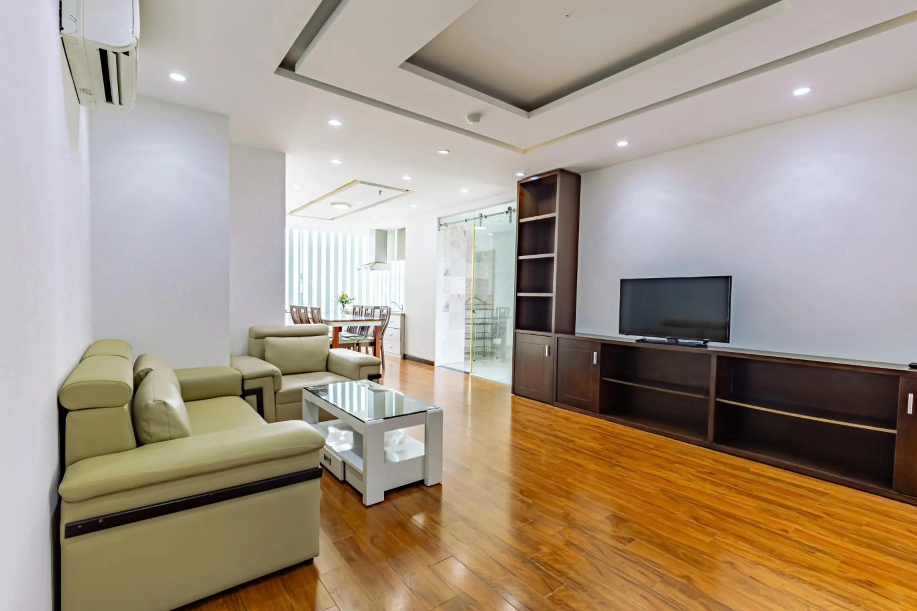 Communal lounge/ TV room in Golden Sun Apartment by New Sky Travel