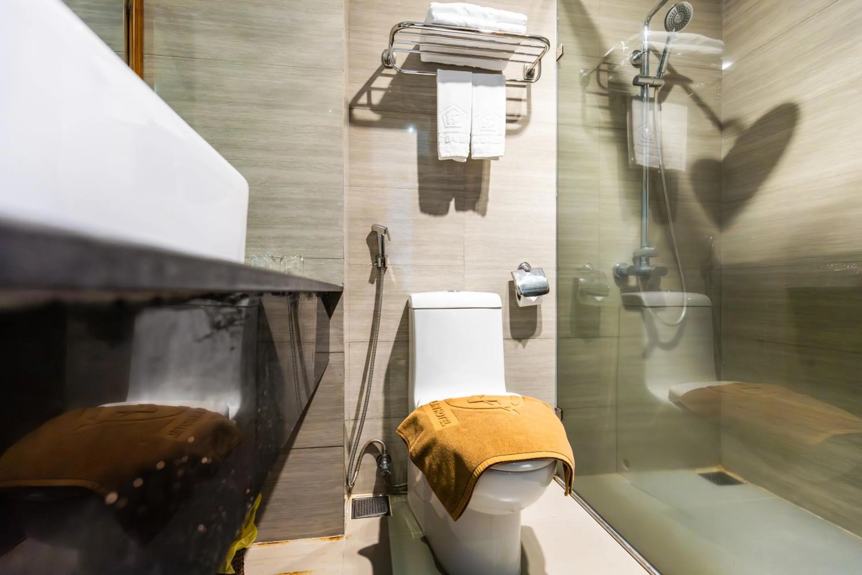 Bathroom in Golden Sun Apartment by New Sky Travel