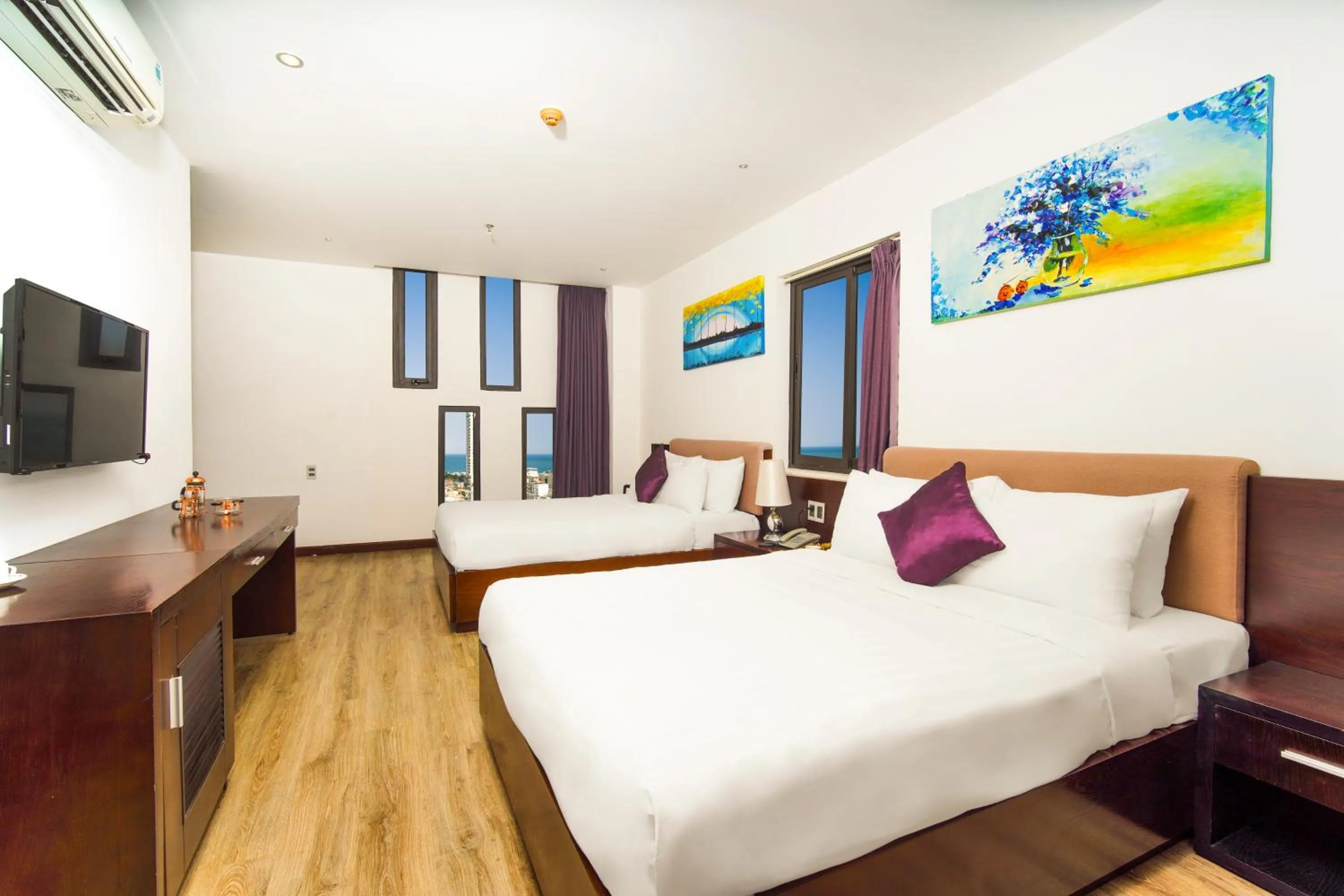 Bed in Golden Sun Apartment by New Sky Travel