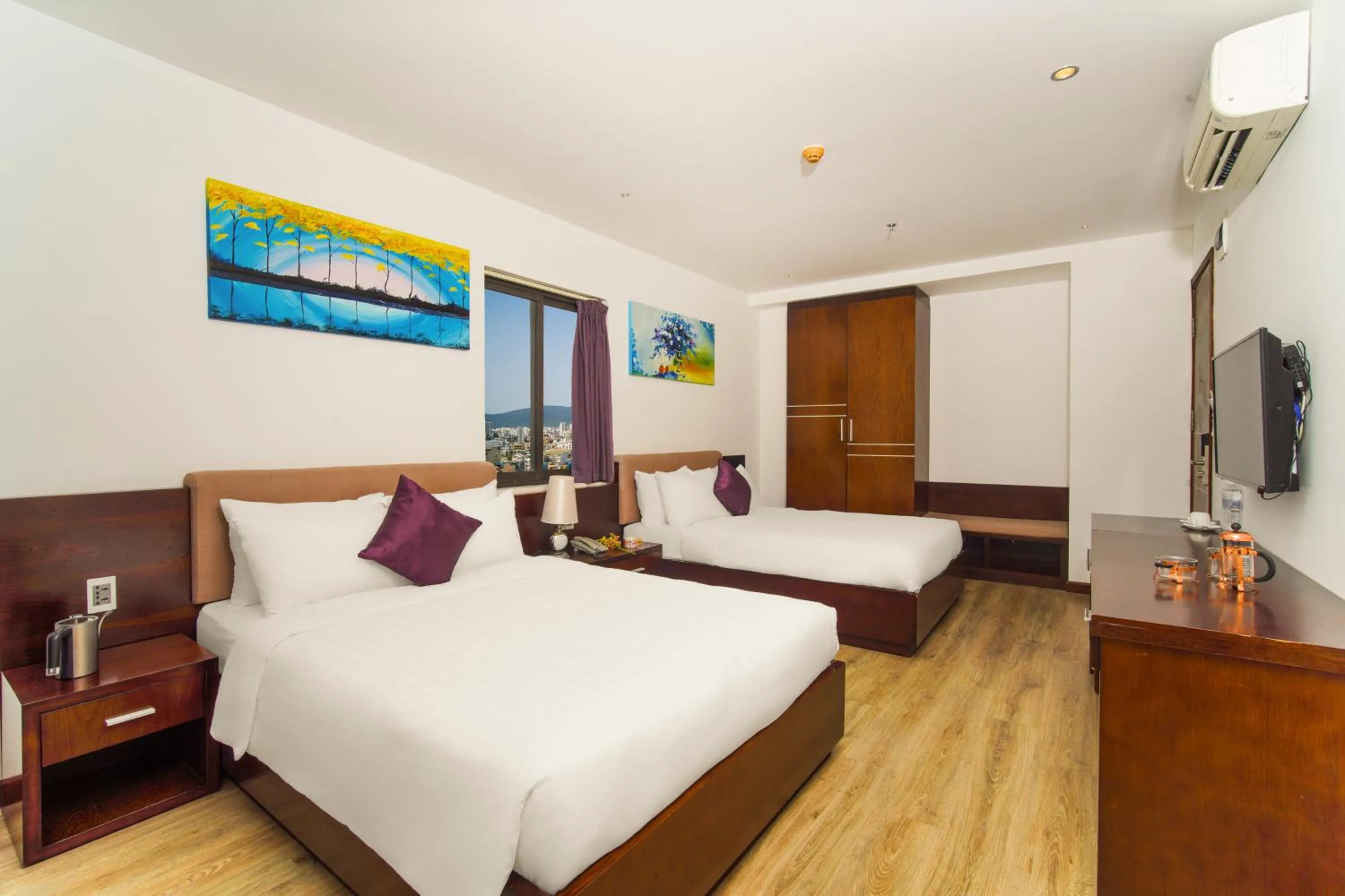 Bed in Golden Sun Apartment by New Sky Travel