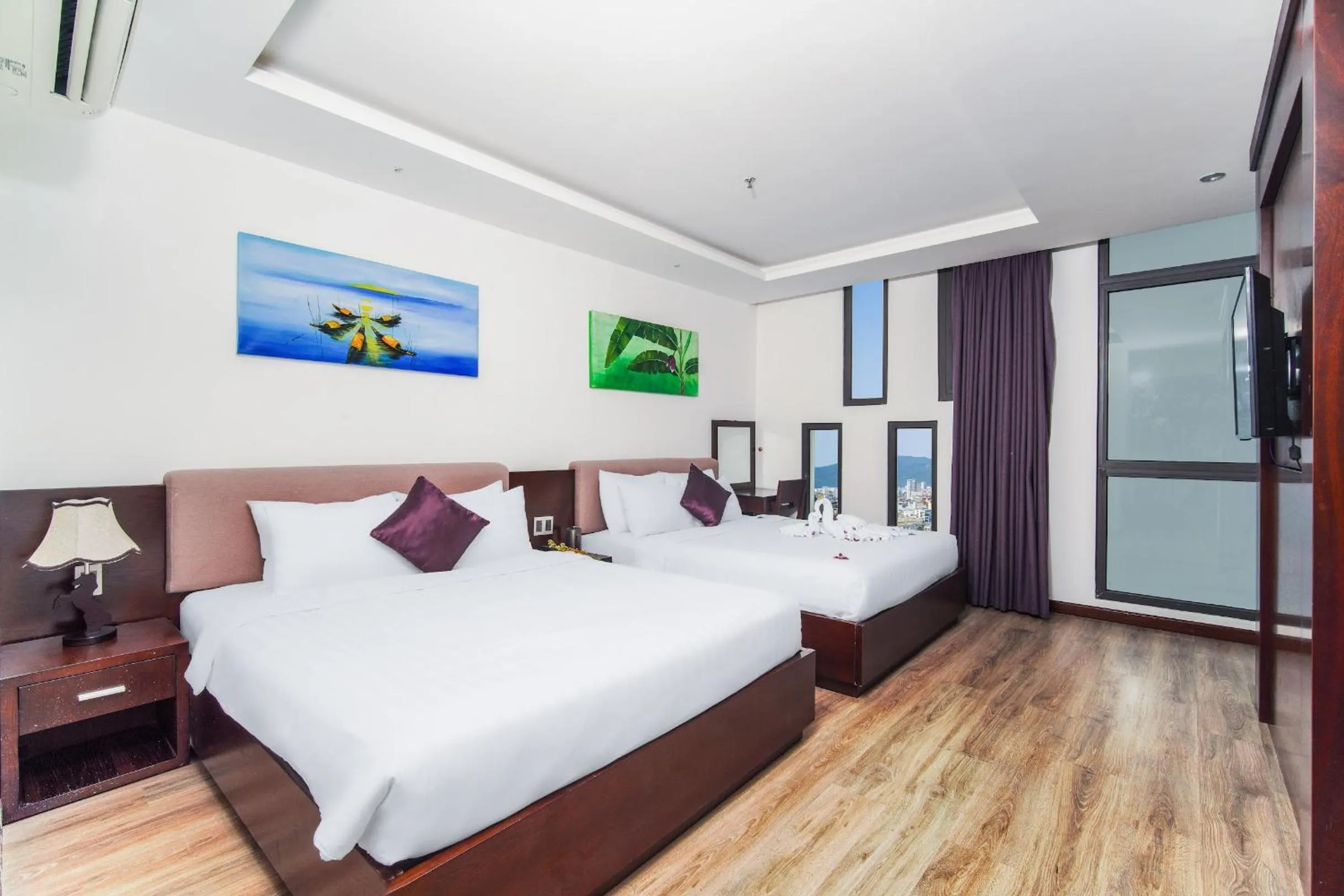 Bed in Golden Sun Apartment by New Sky Travel
