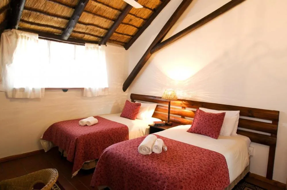 Bed in Woodpecker Inn