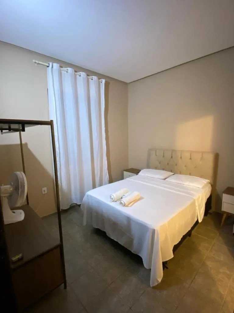 Bed in Pousada Caminho do Ribeirão