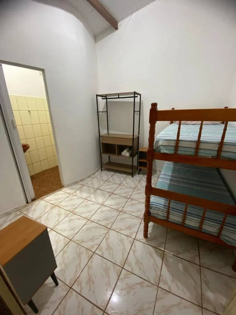 Bed in Pousada Caminho do Ribeirão