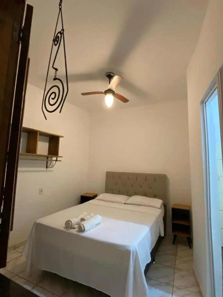 Bed in Pousada Caminho do Ribeirão