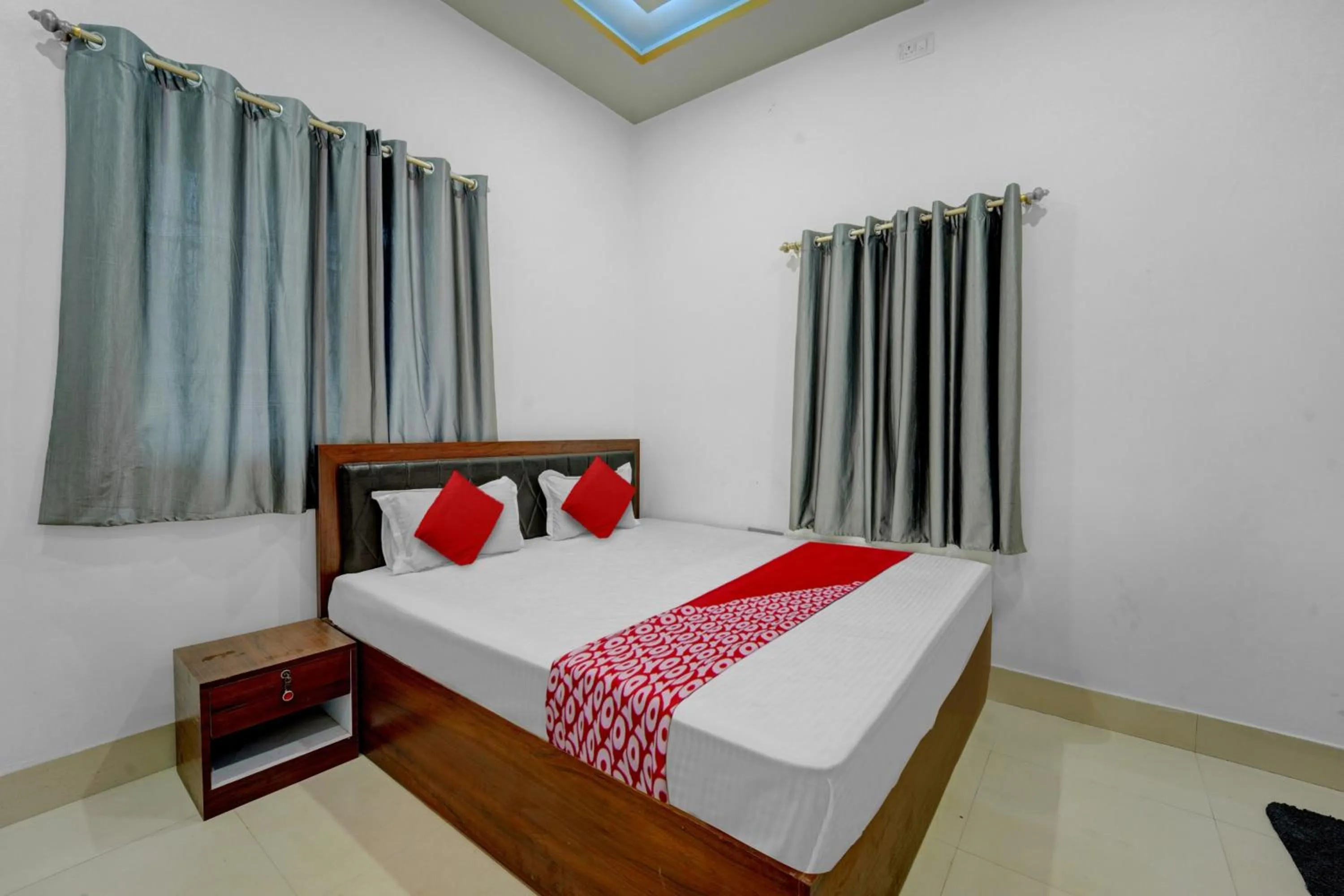 Bedroom, Bed in Super Hotel O Dev Laxmi Palace Hotel & Banquet