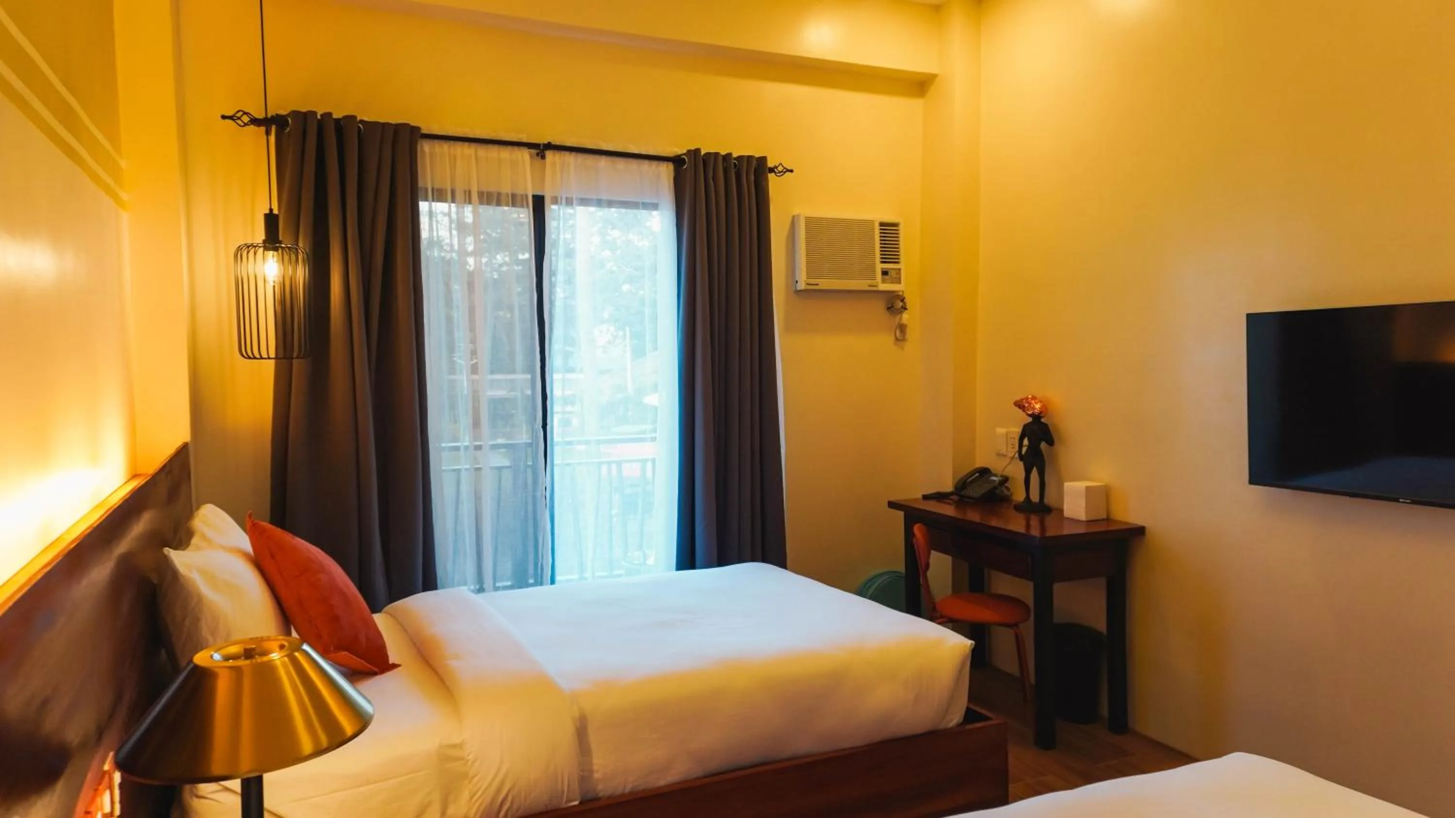 Bed in UNWND Boutique Hotel Camiguin