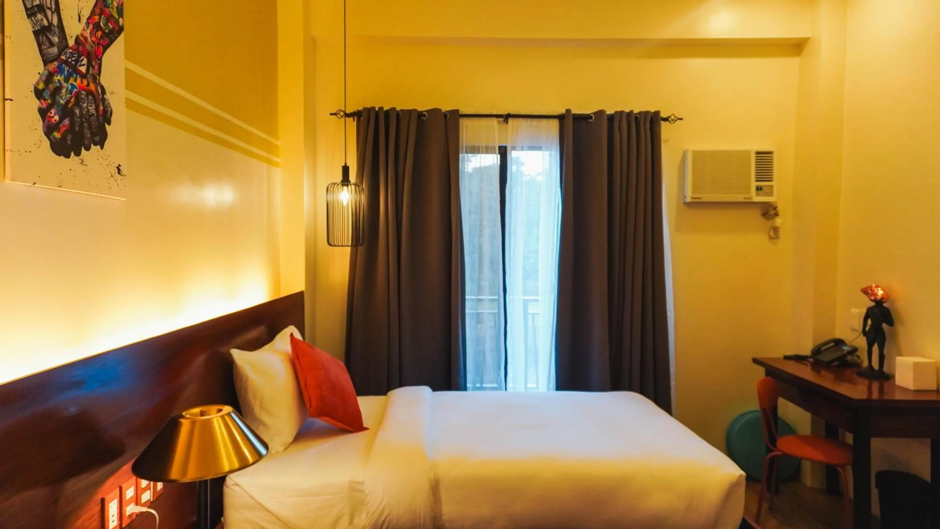 Bed in UNWND Boutique Hotel Camiguin