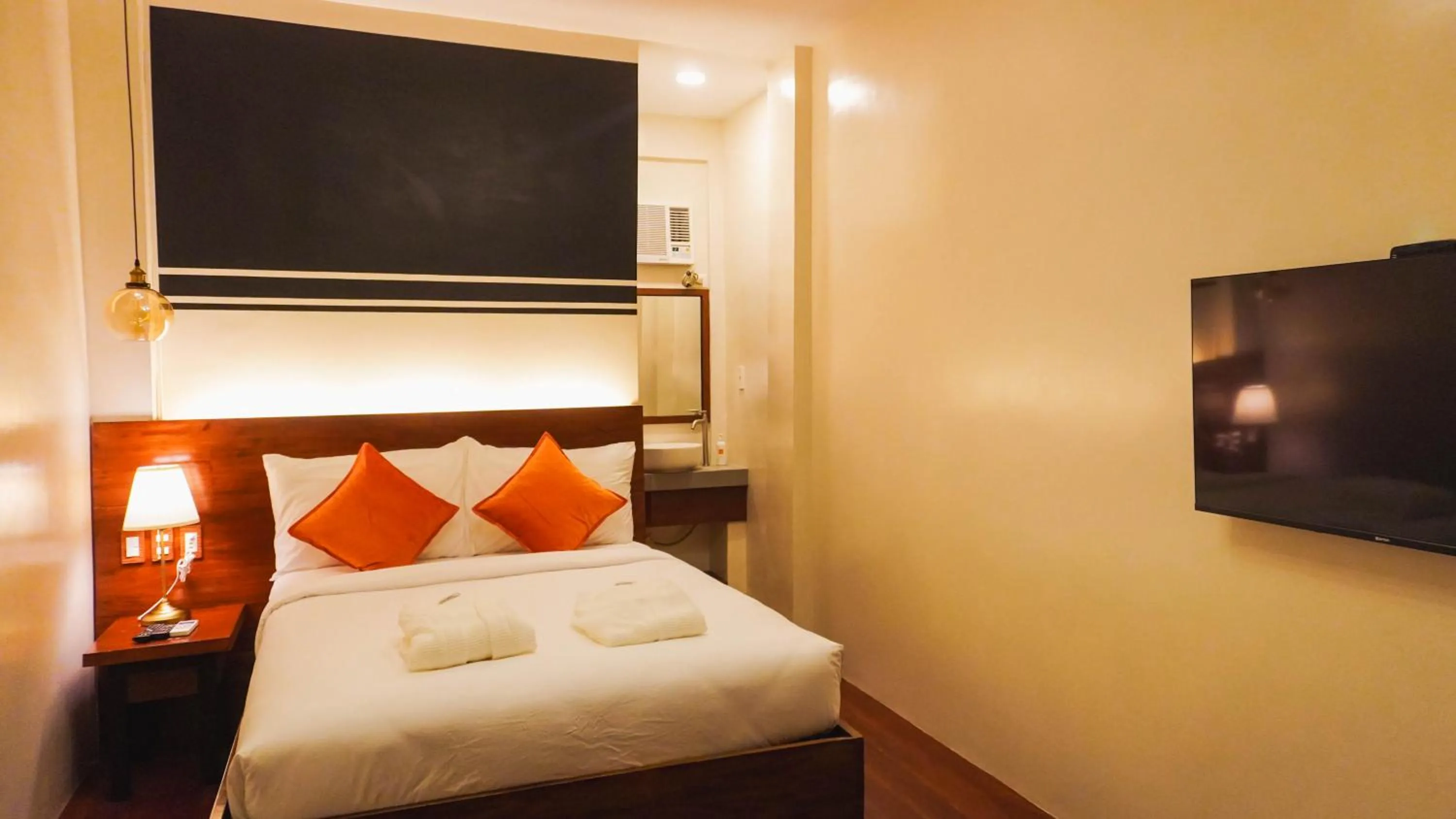 Bed in UNWND Boutique Hotel Camiguin