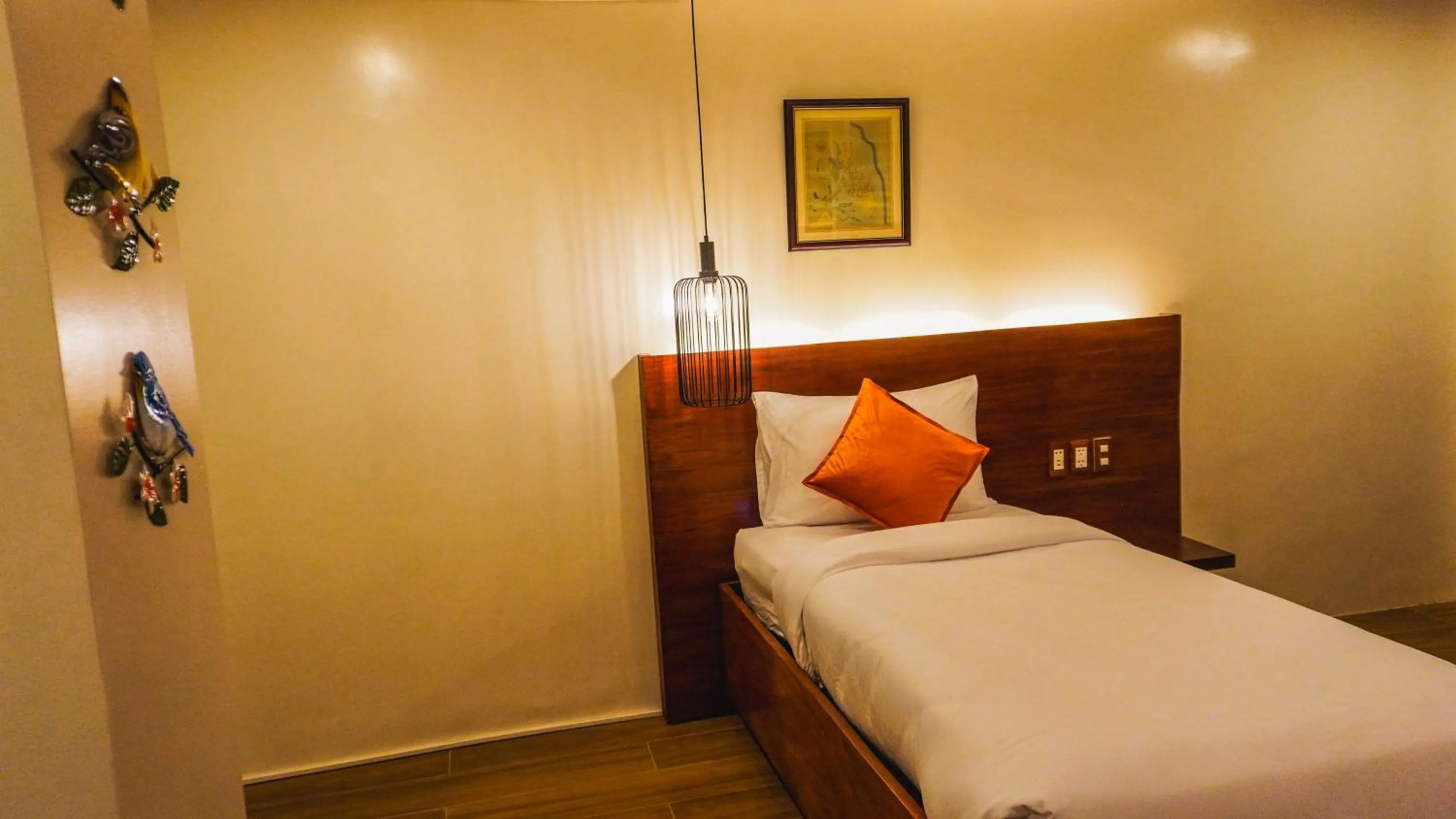 Bed in UNWND Boutique Hotel Camiguin