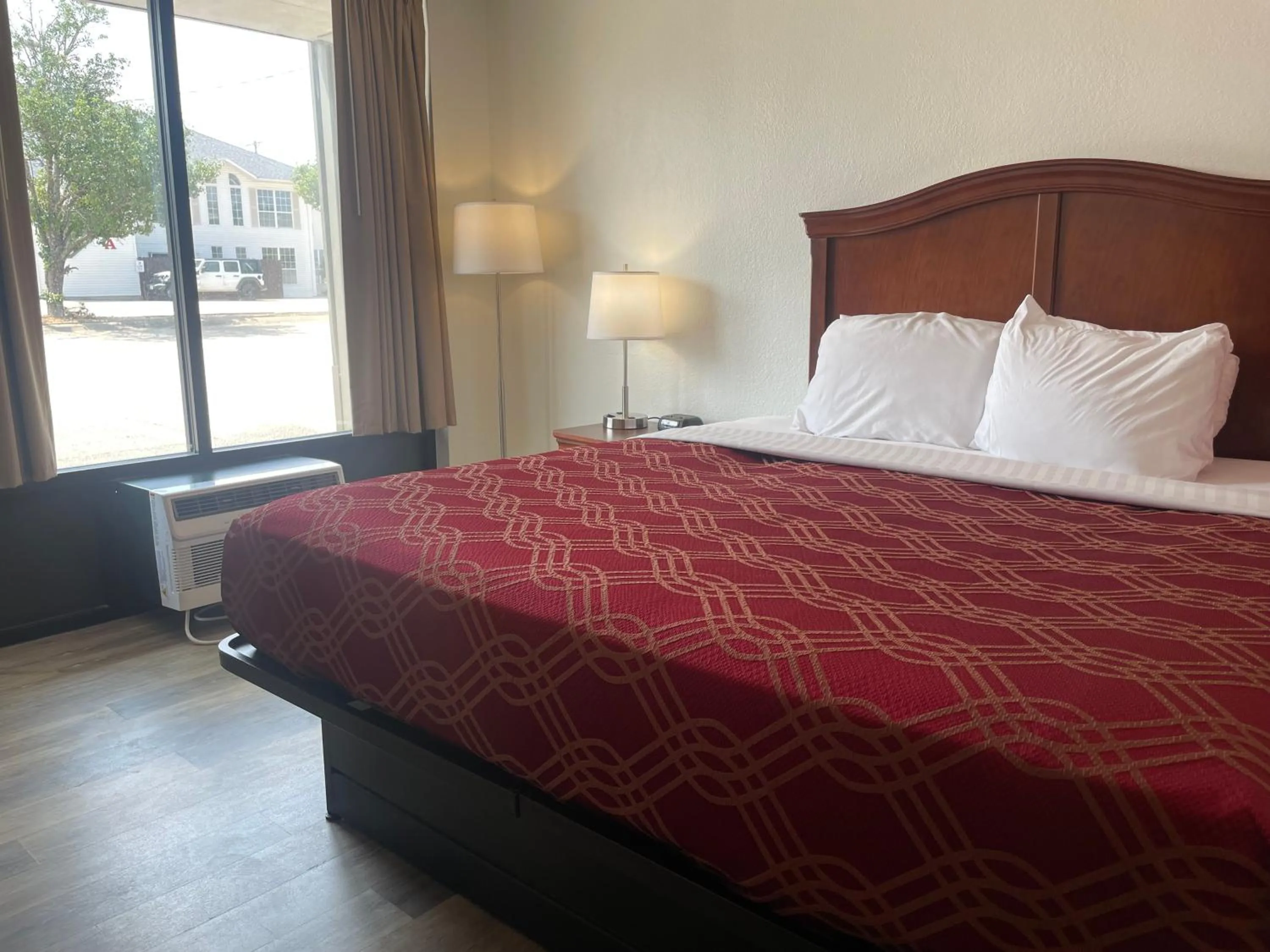 Bed in Ramada by Wyndham Branson Theatre District
