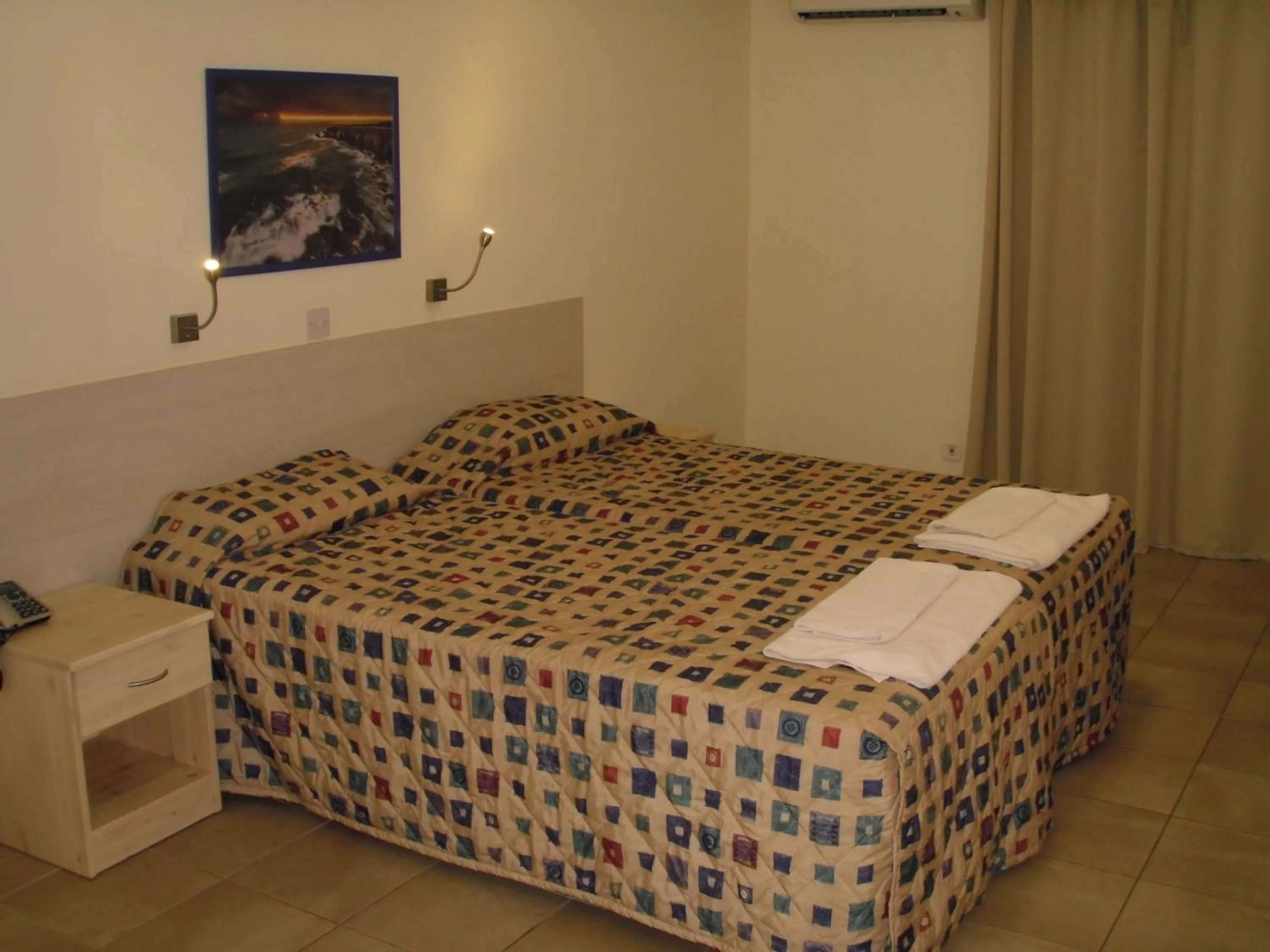 Bed in Eligonia Hotel Apartments