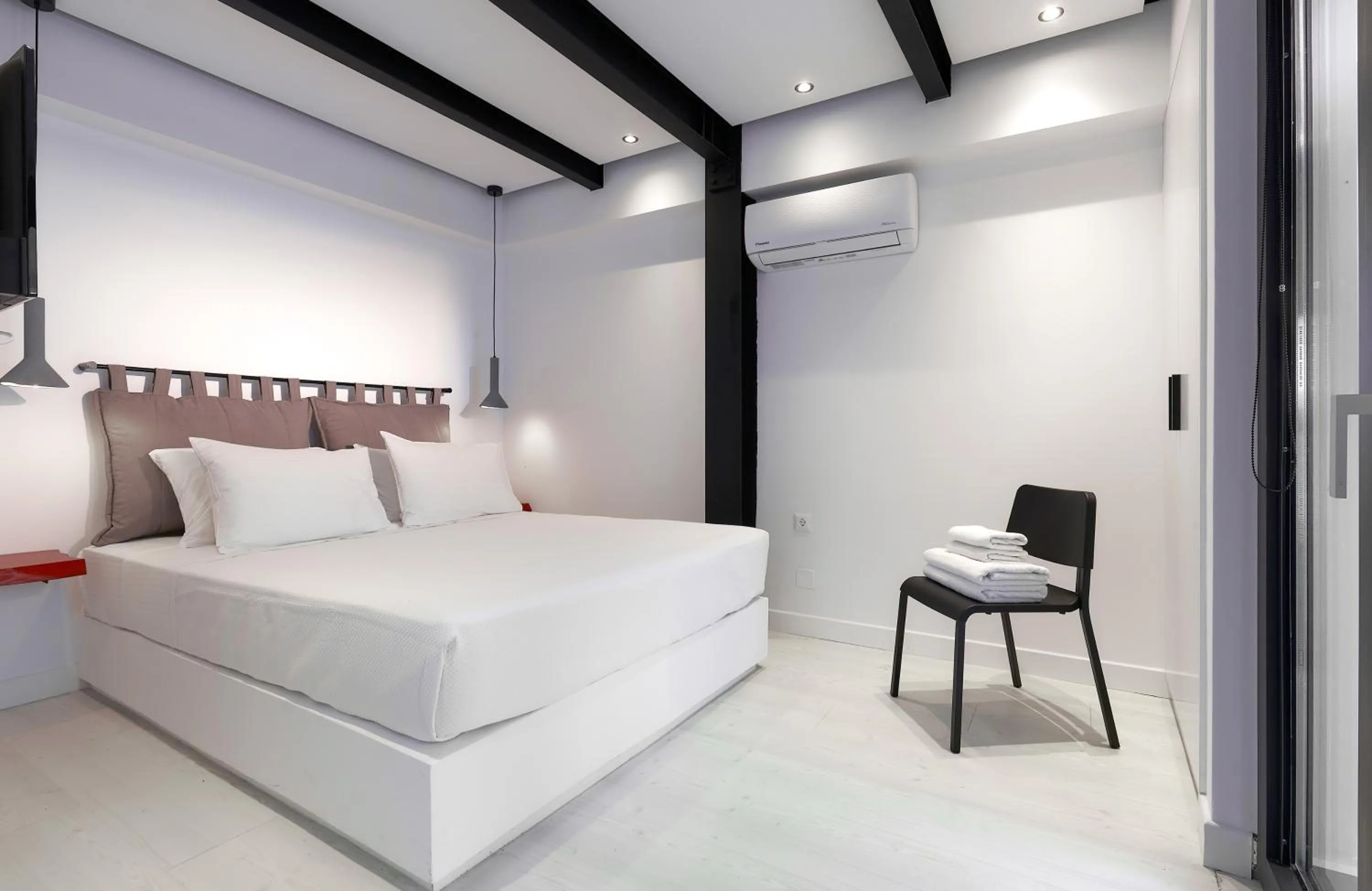 Shower, Bed in MichELe Luxury apartments by Smaris Collection