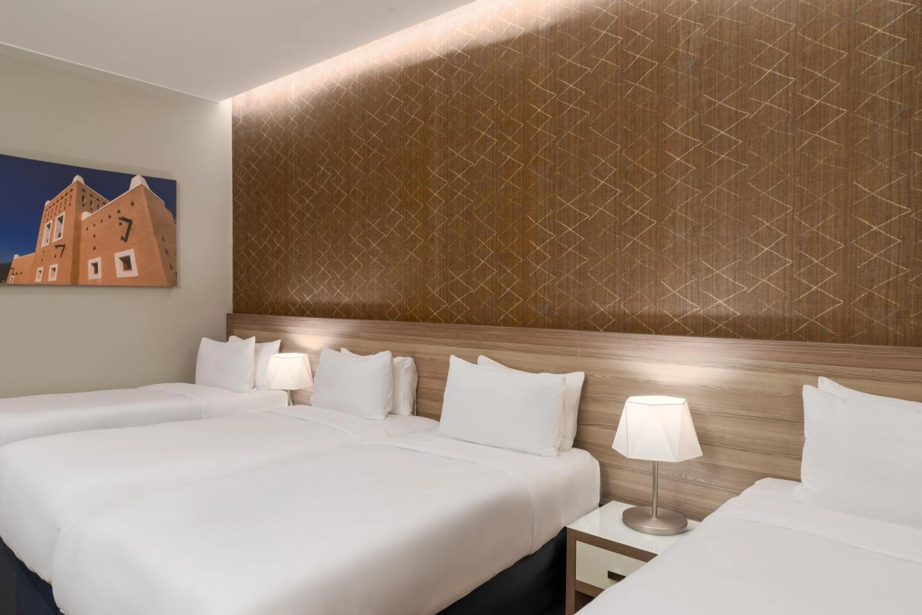 Bed in Mercure Makkah Aziziah