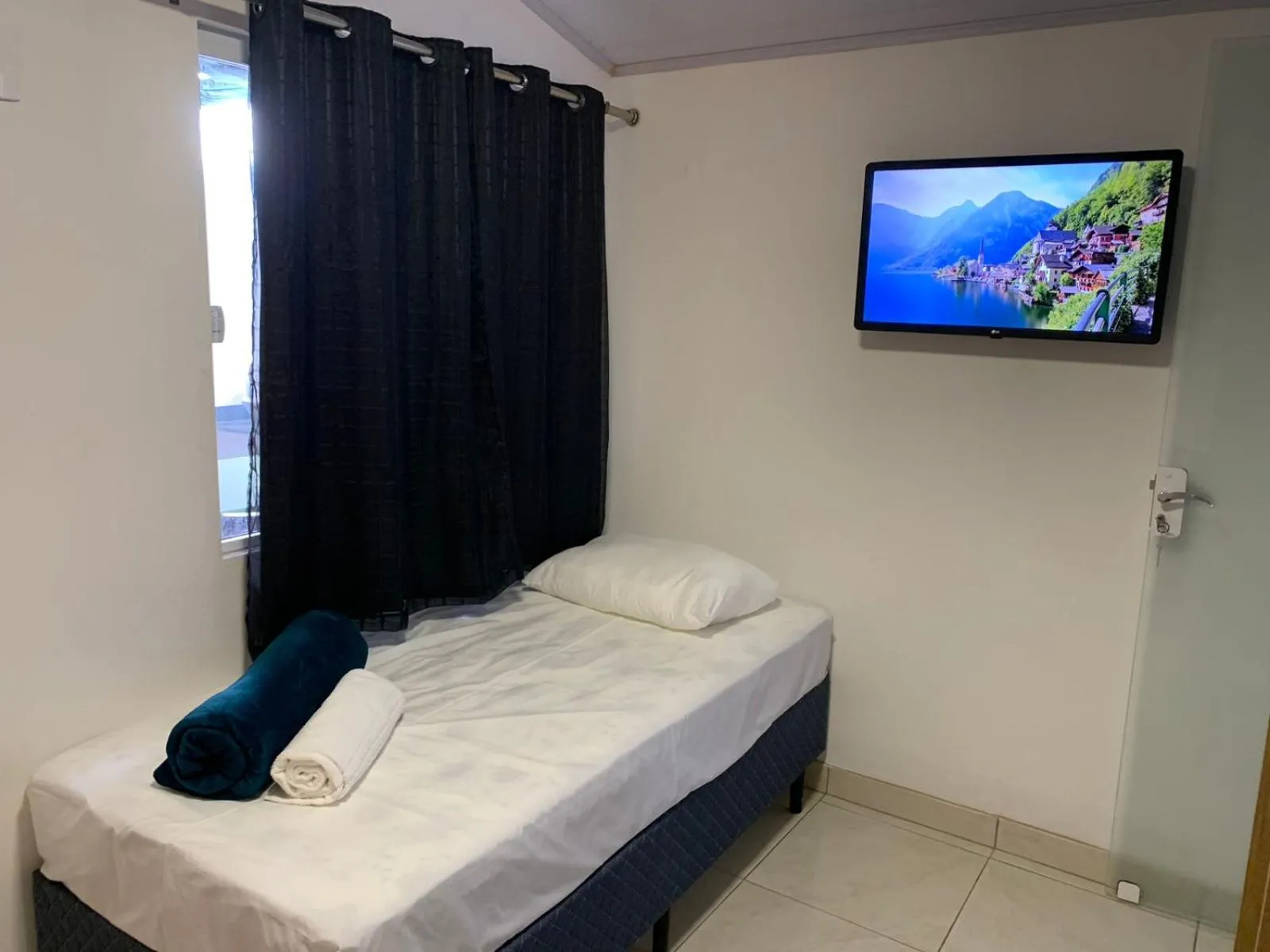 Bed in Pousada Perola da Praia