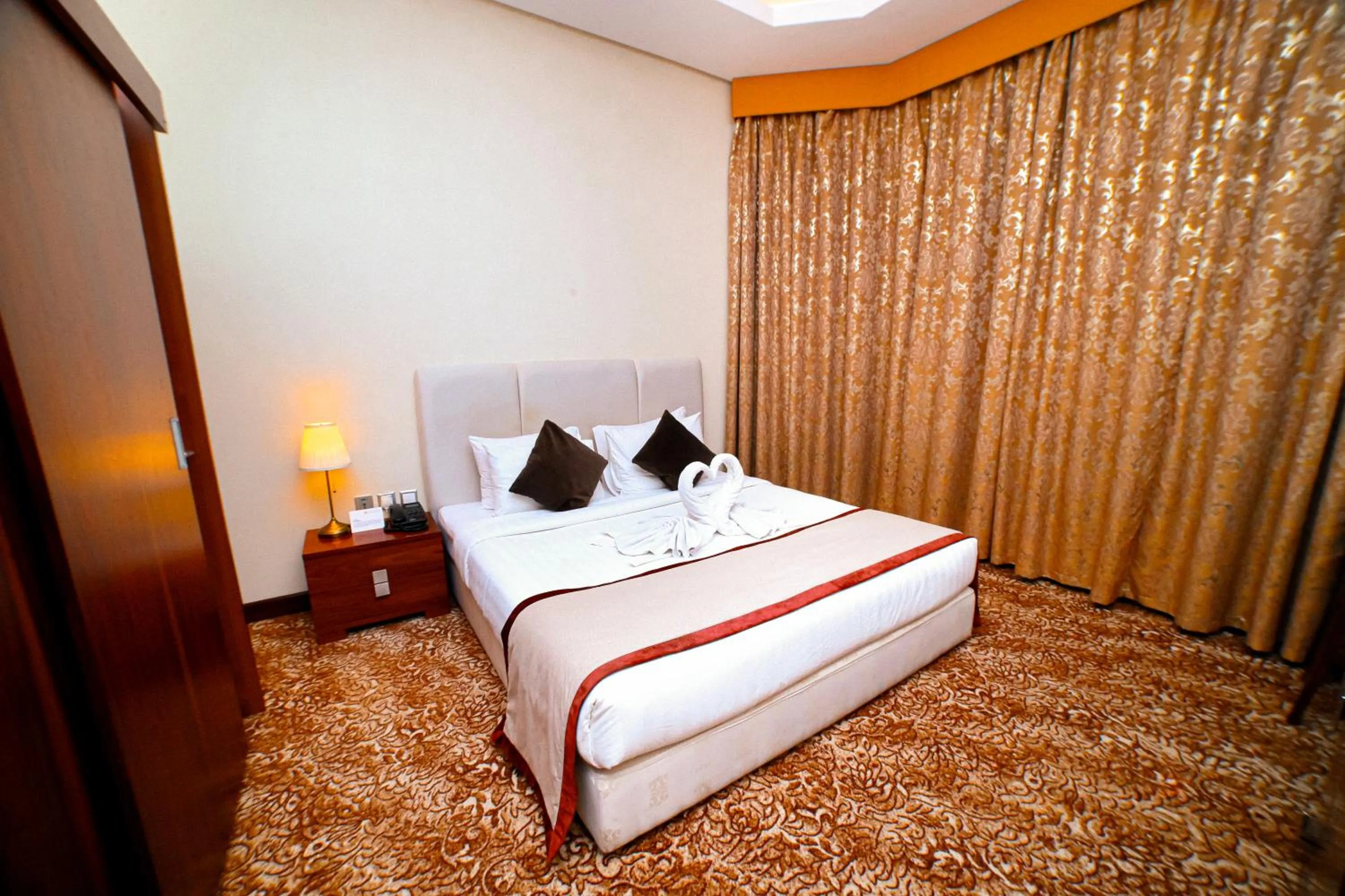 Bed in GREEN GARDEN HOTEL