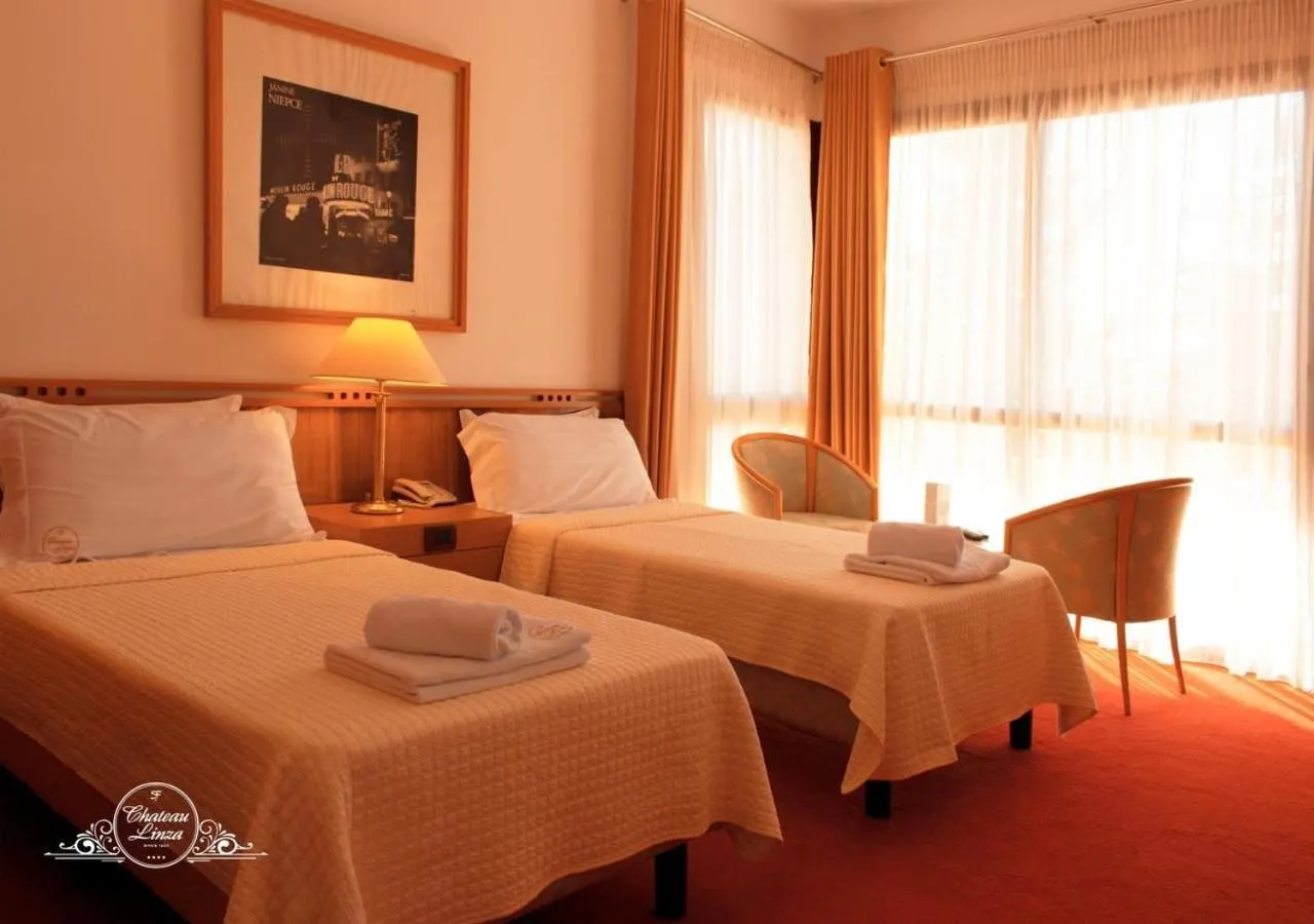 Bed in Chateau Linza Resort