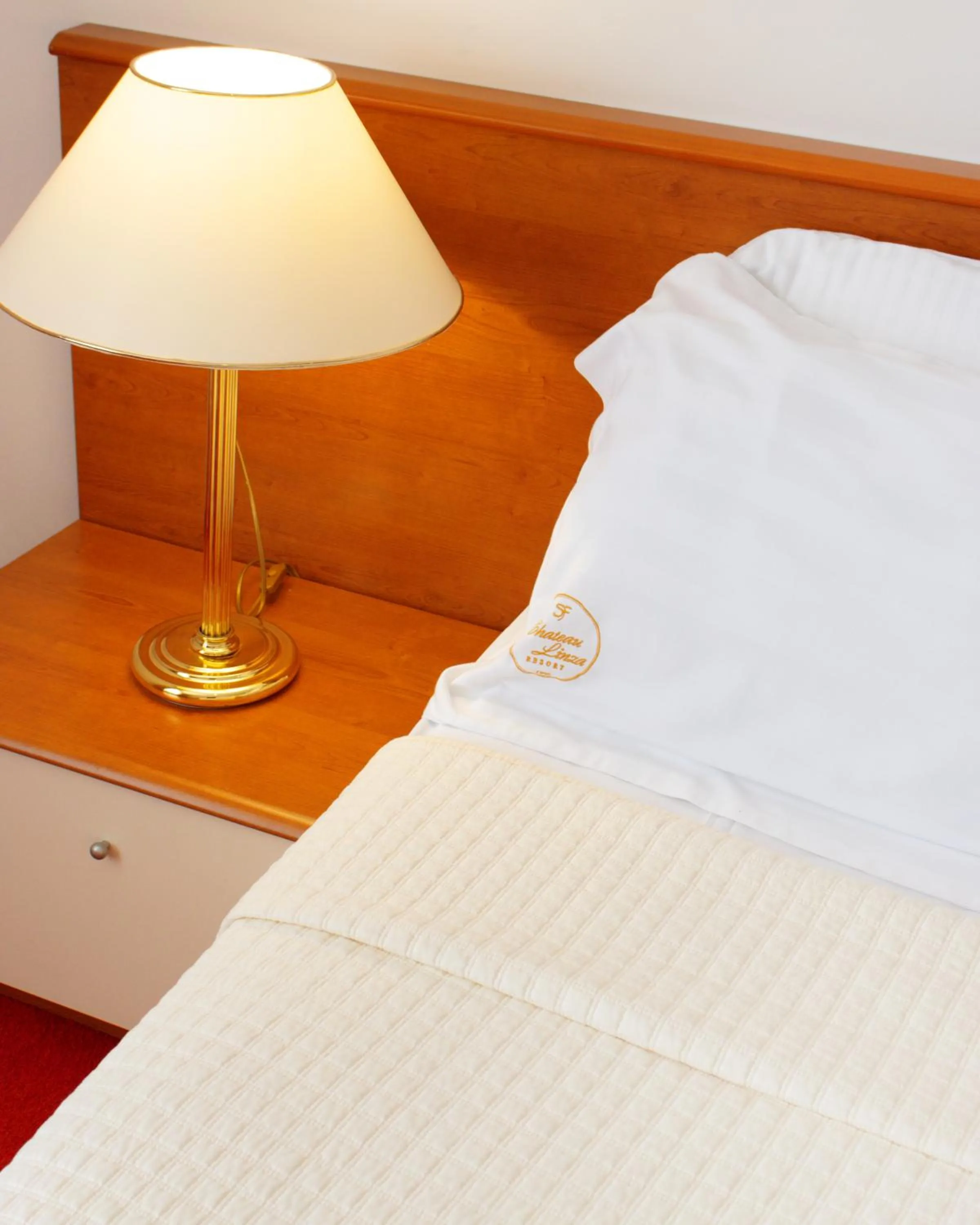 Bed in Chateau Linza Resort