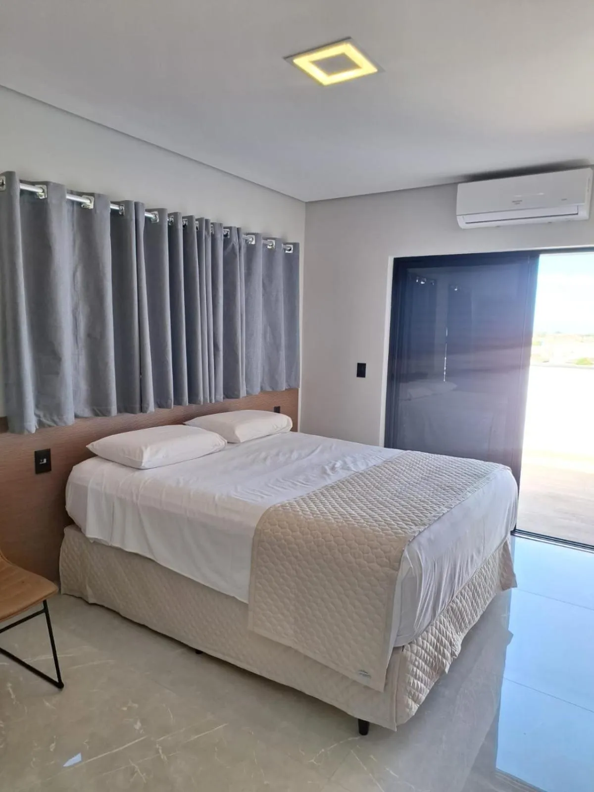 Bed in Optimum Plaza Hotel