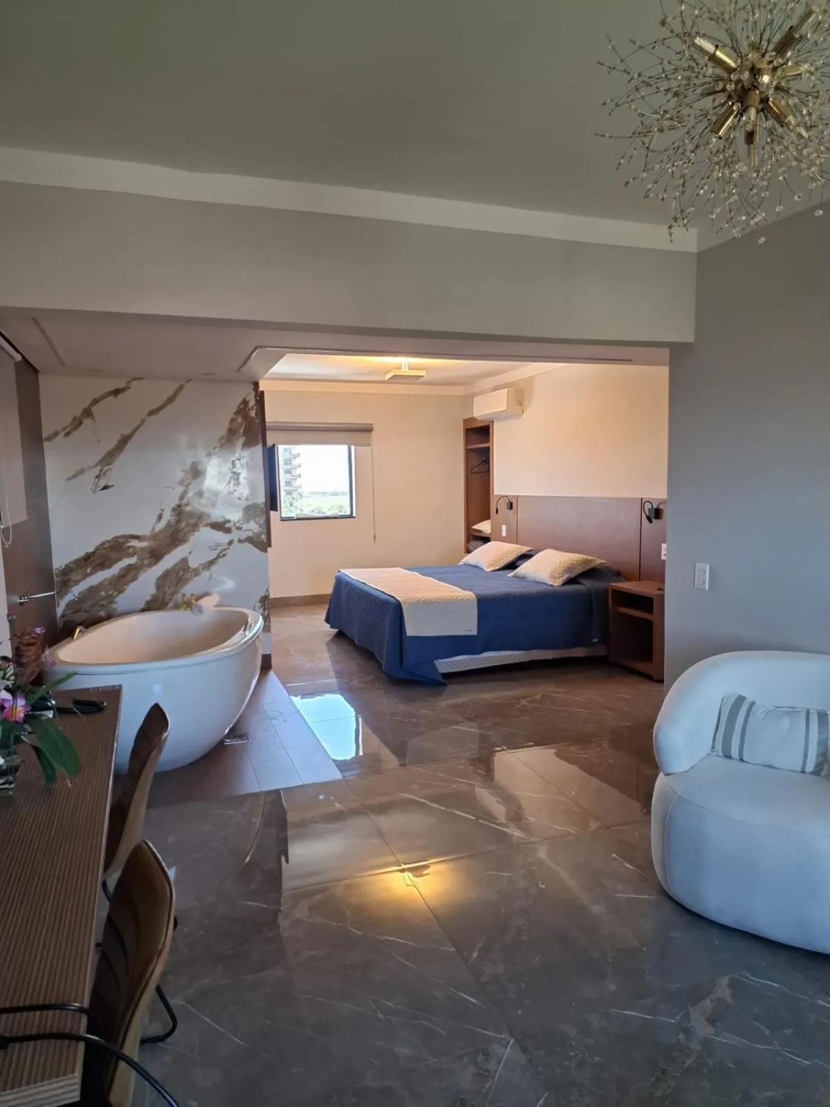 Bed in Optimum Plaza Hotel