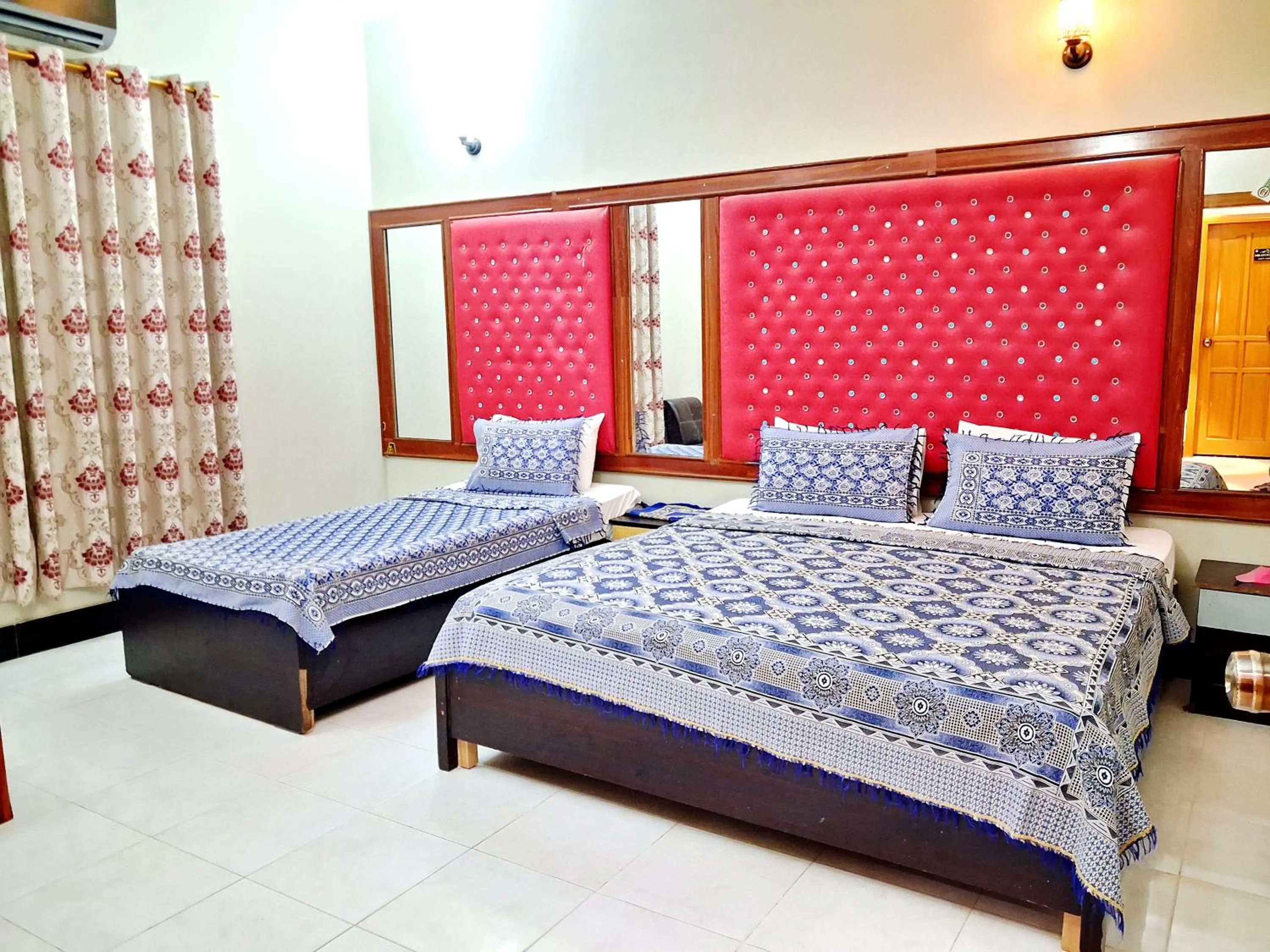 Bed in Rose Palace Guest House