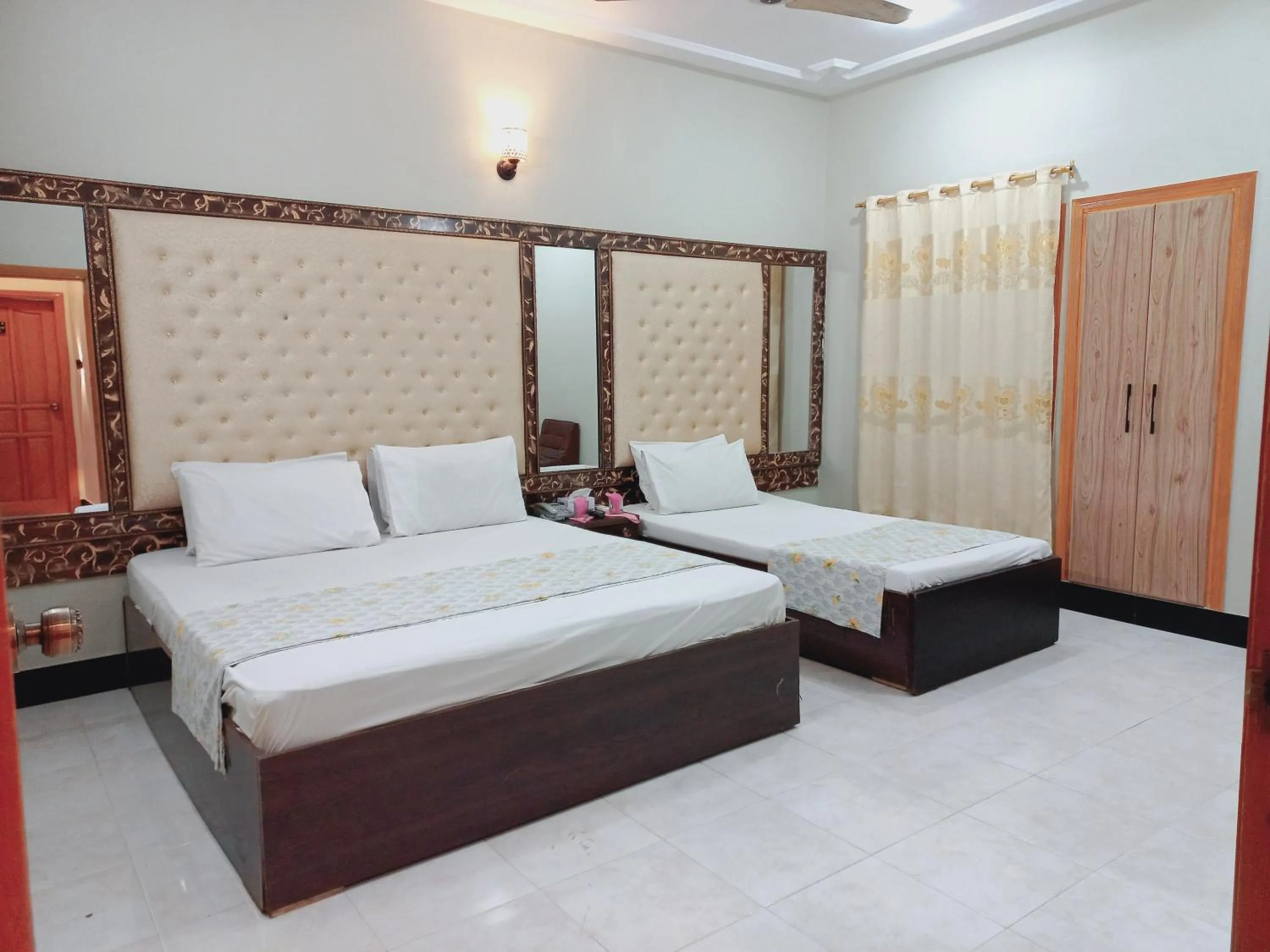 Bed in Rose Palace Guest House