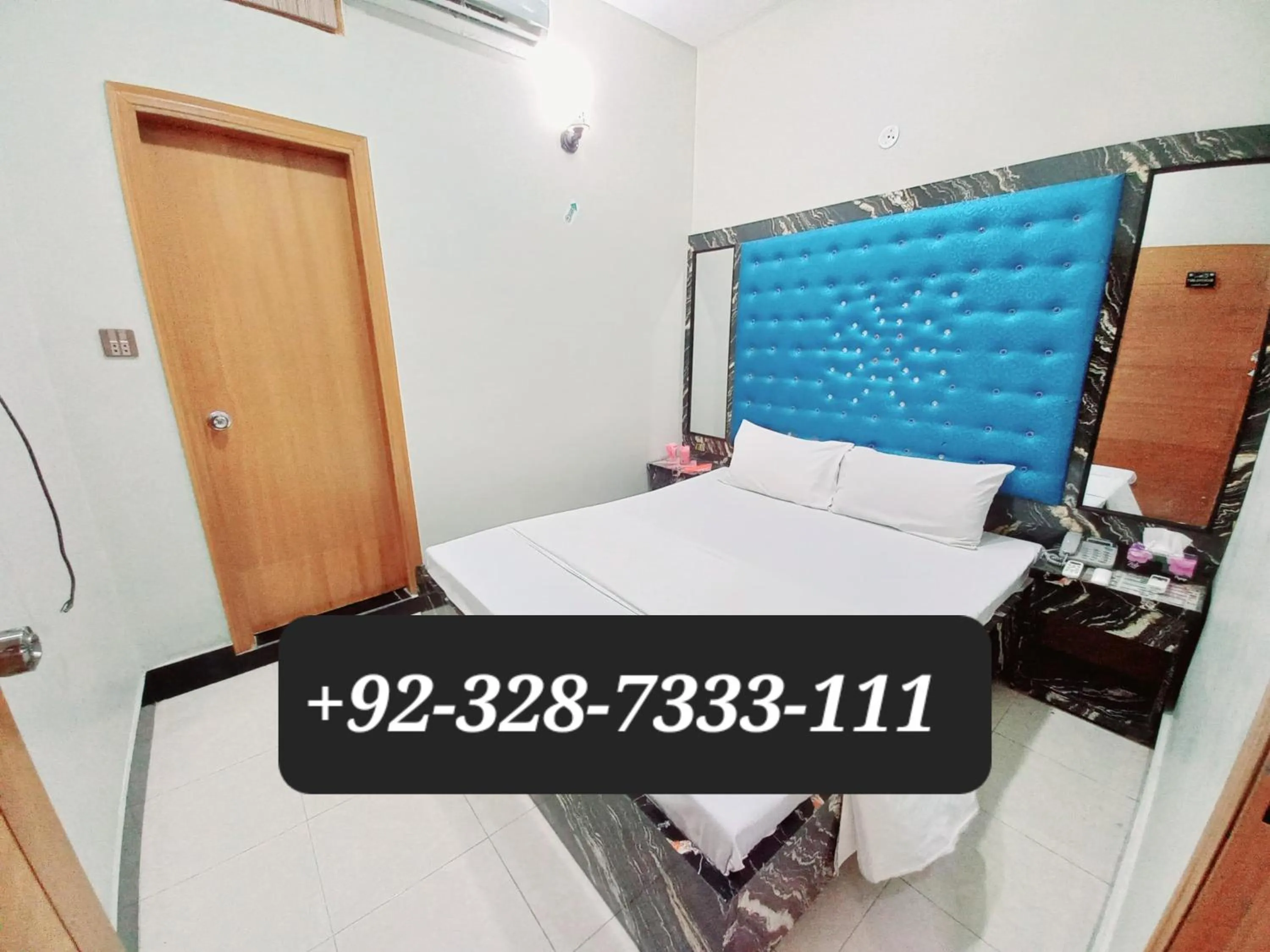 Bed in Rose Palace Guest House