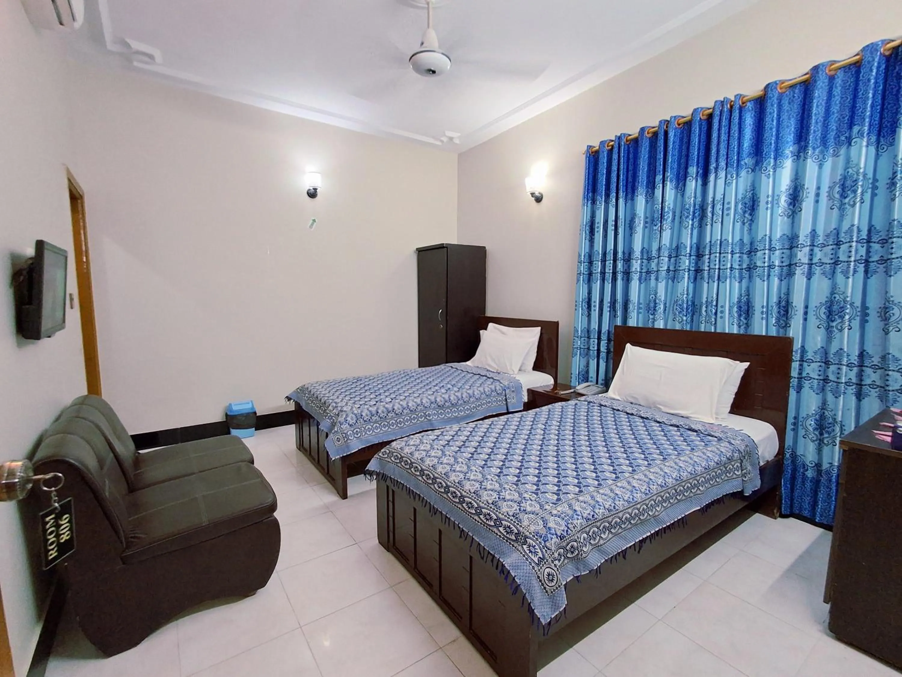 Bed in Rose Palace Guest House