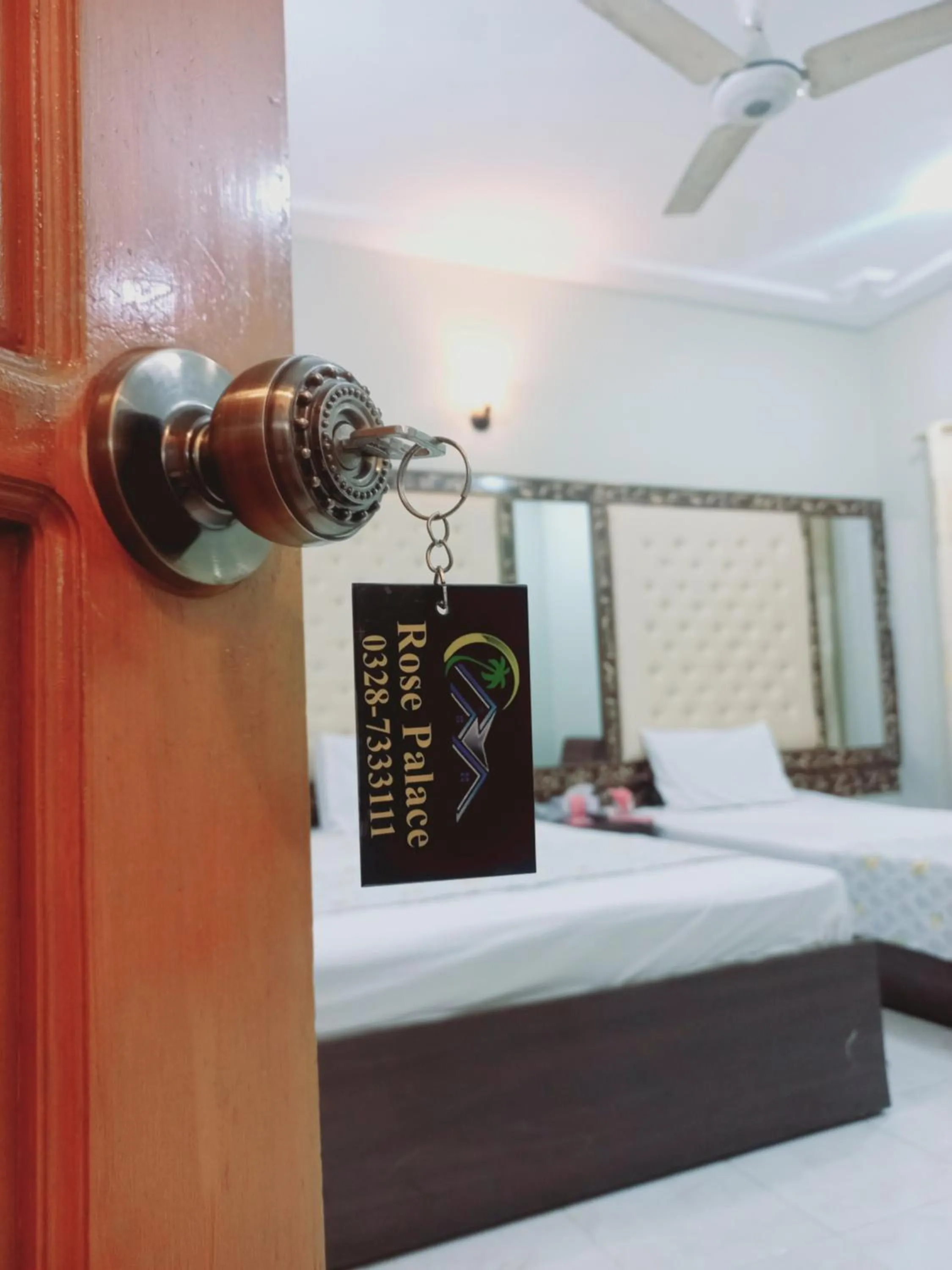 Bed in Rose Palace Guest House