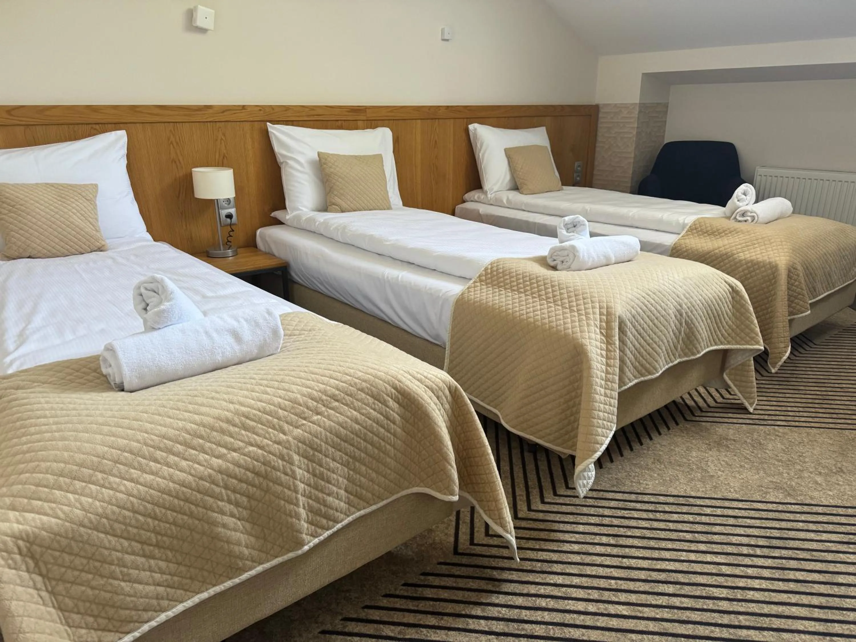 Bed in IRIS Aparthotel