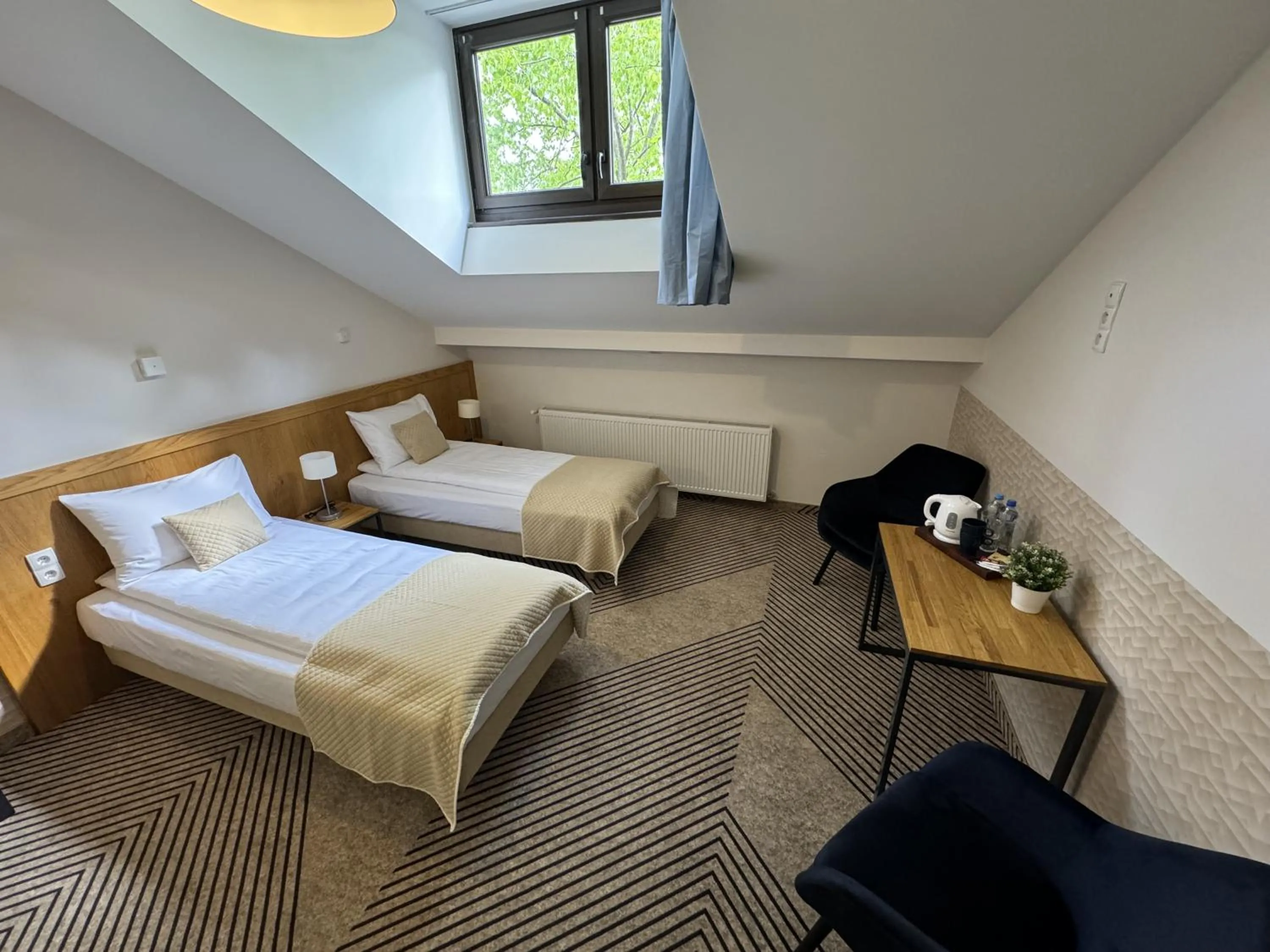 Bed in IRIS Aparthotel