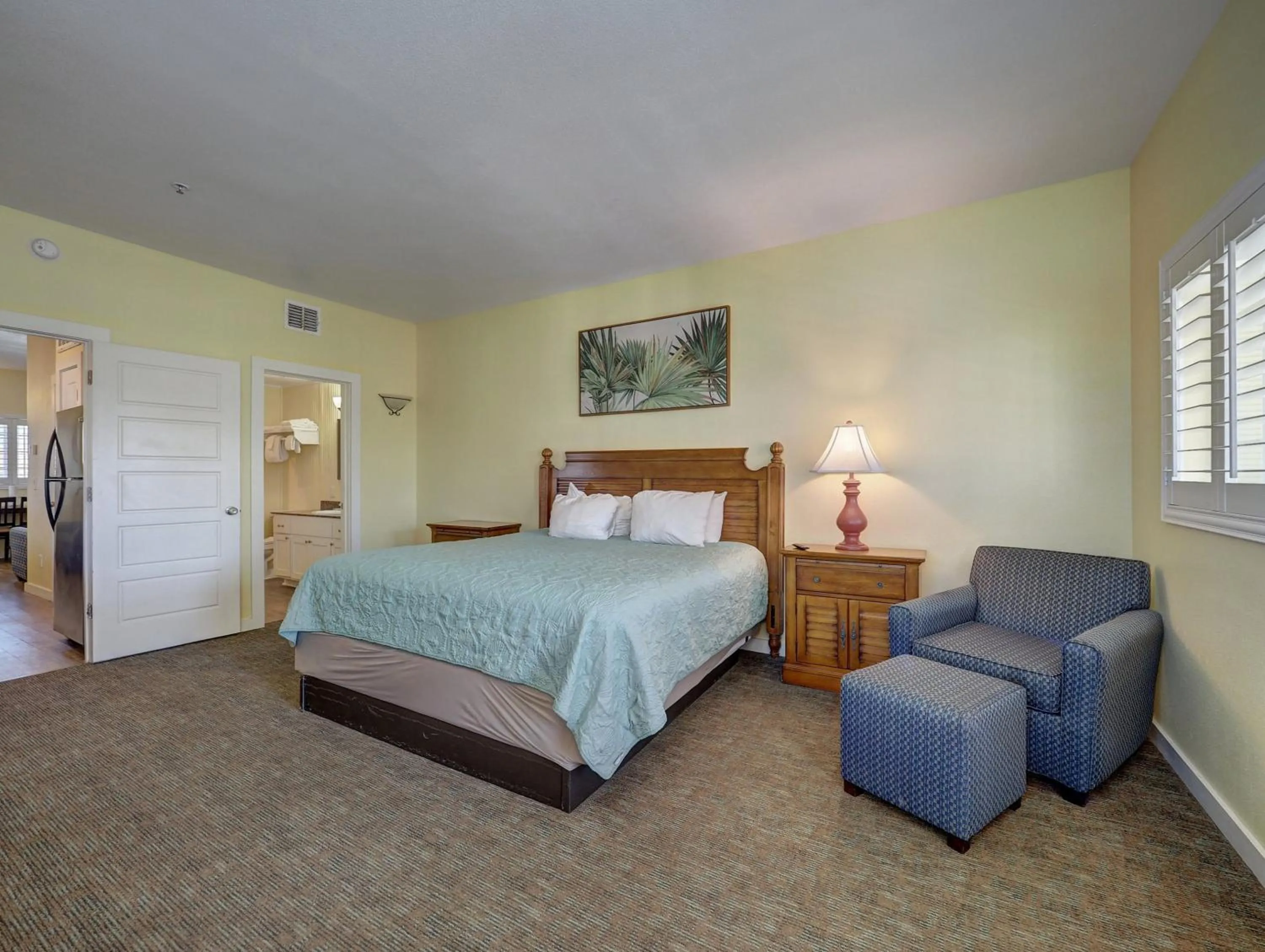 Bed in Seashell Village Resort near the beach with kitchens