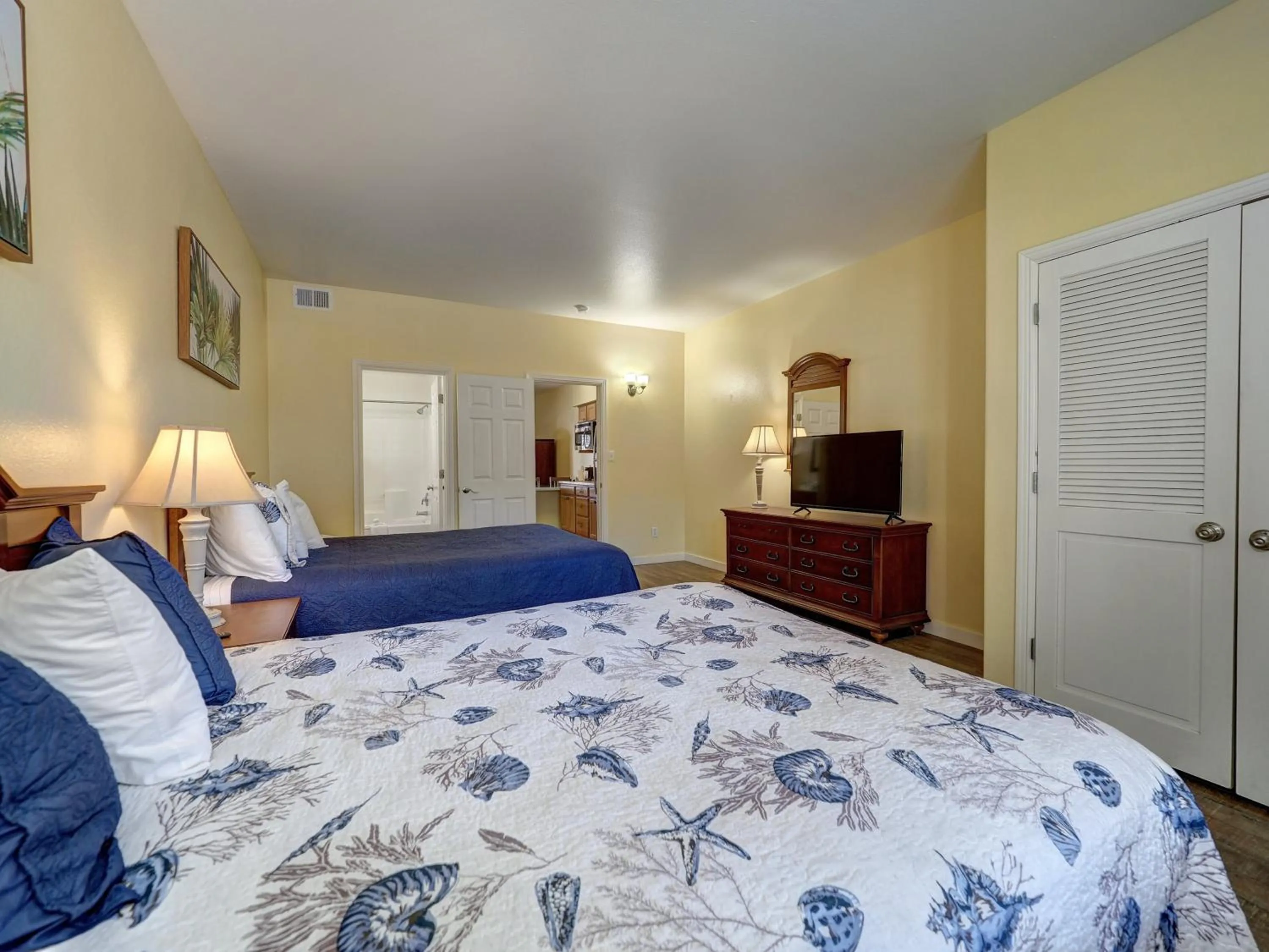 Bed in Seashell Village Resort near the beach with kitchens