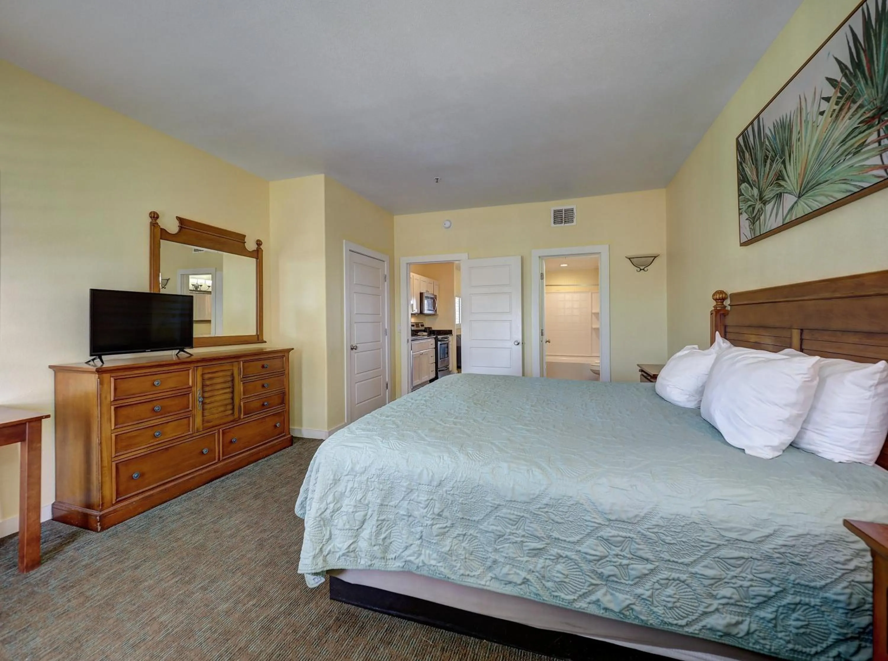 Bed in Seashell Village Resort near the beach with kitchens