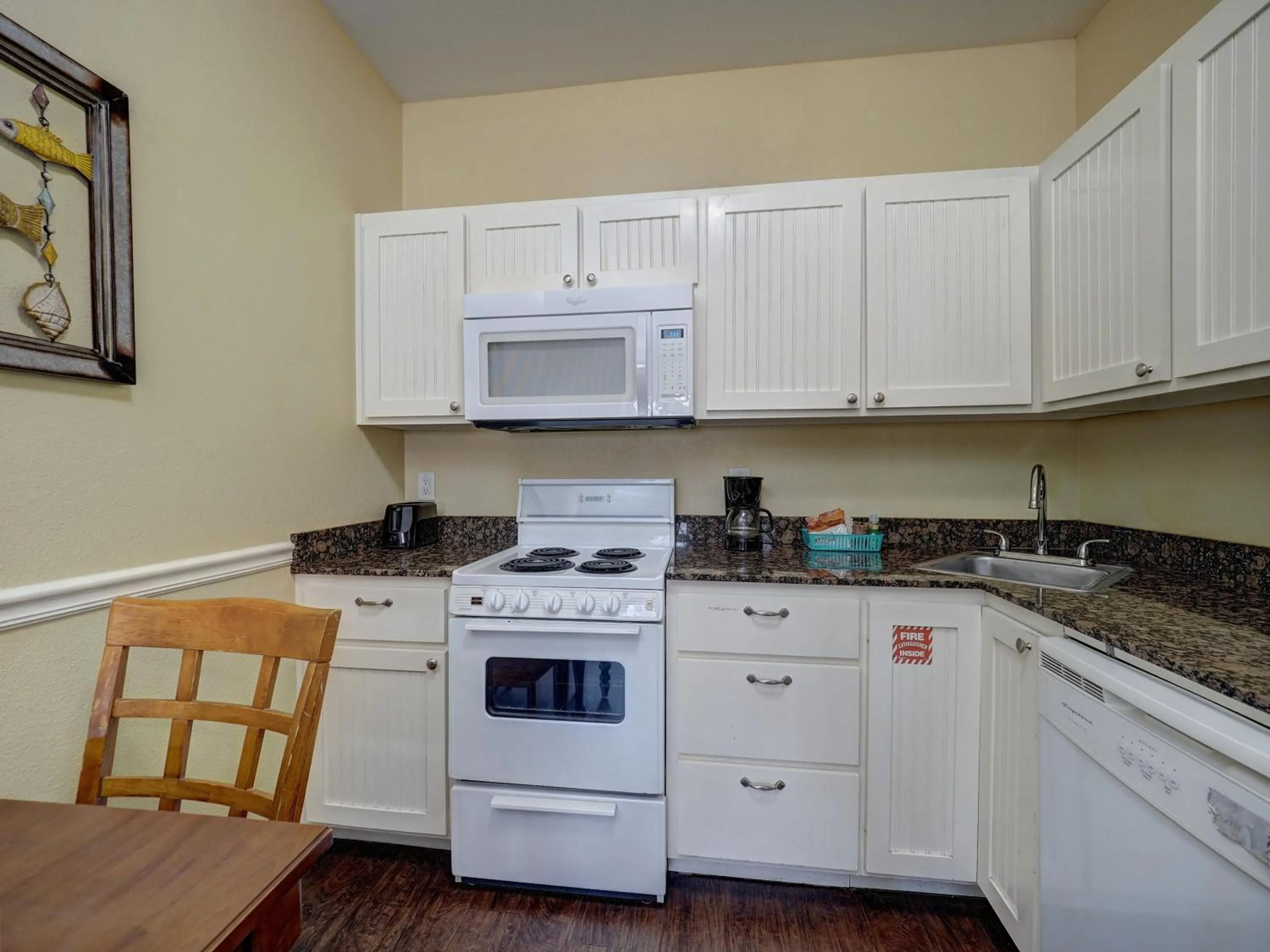 Kitchen or kitchenette in Seashell Village Resort near the beach with kitchens