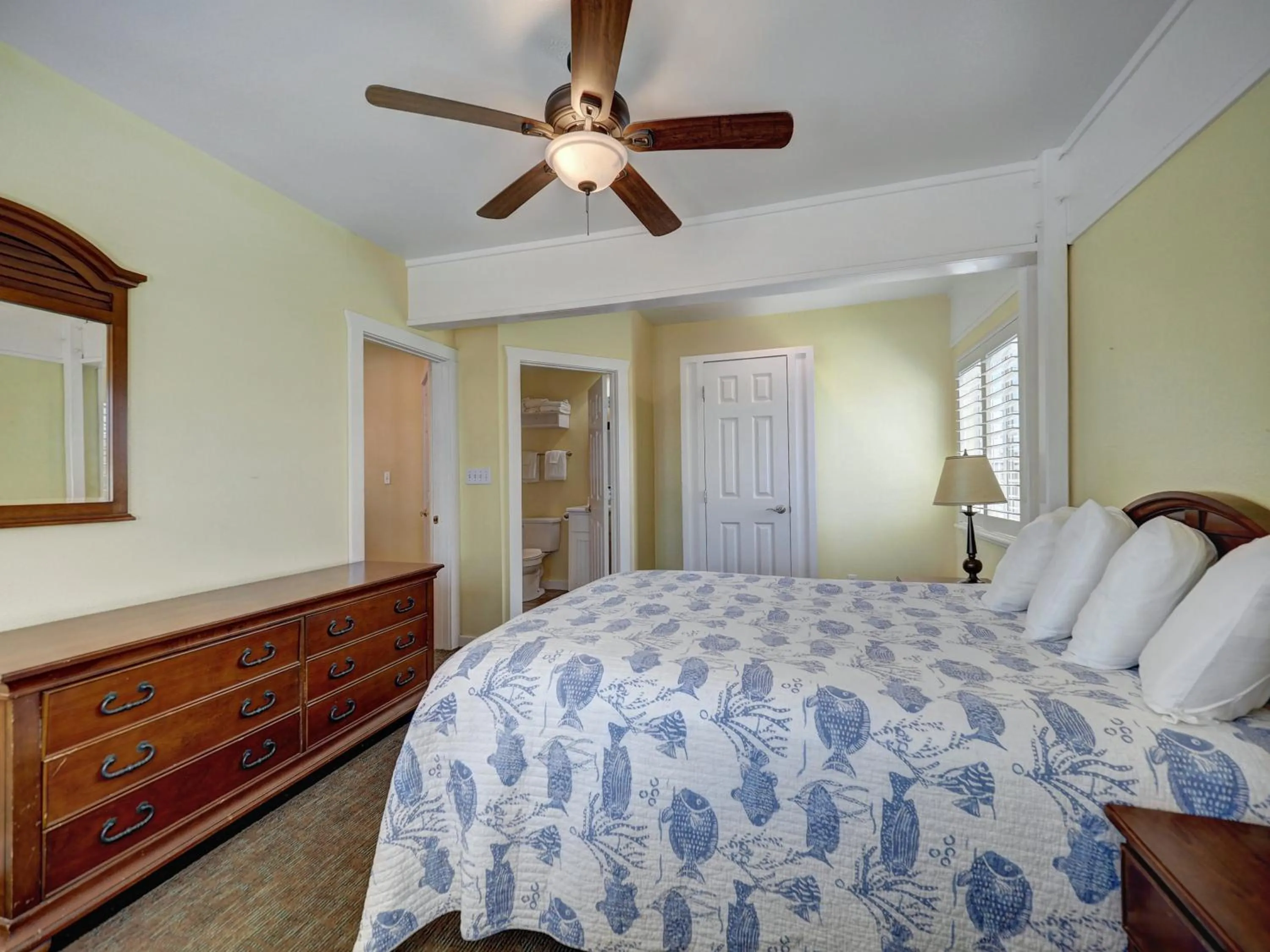 Bed in Seashell Village Resort near the beach with kitchens