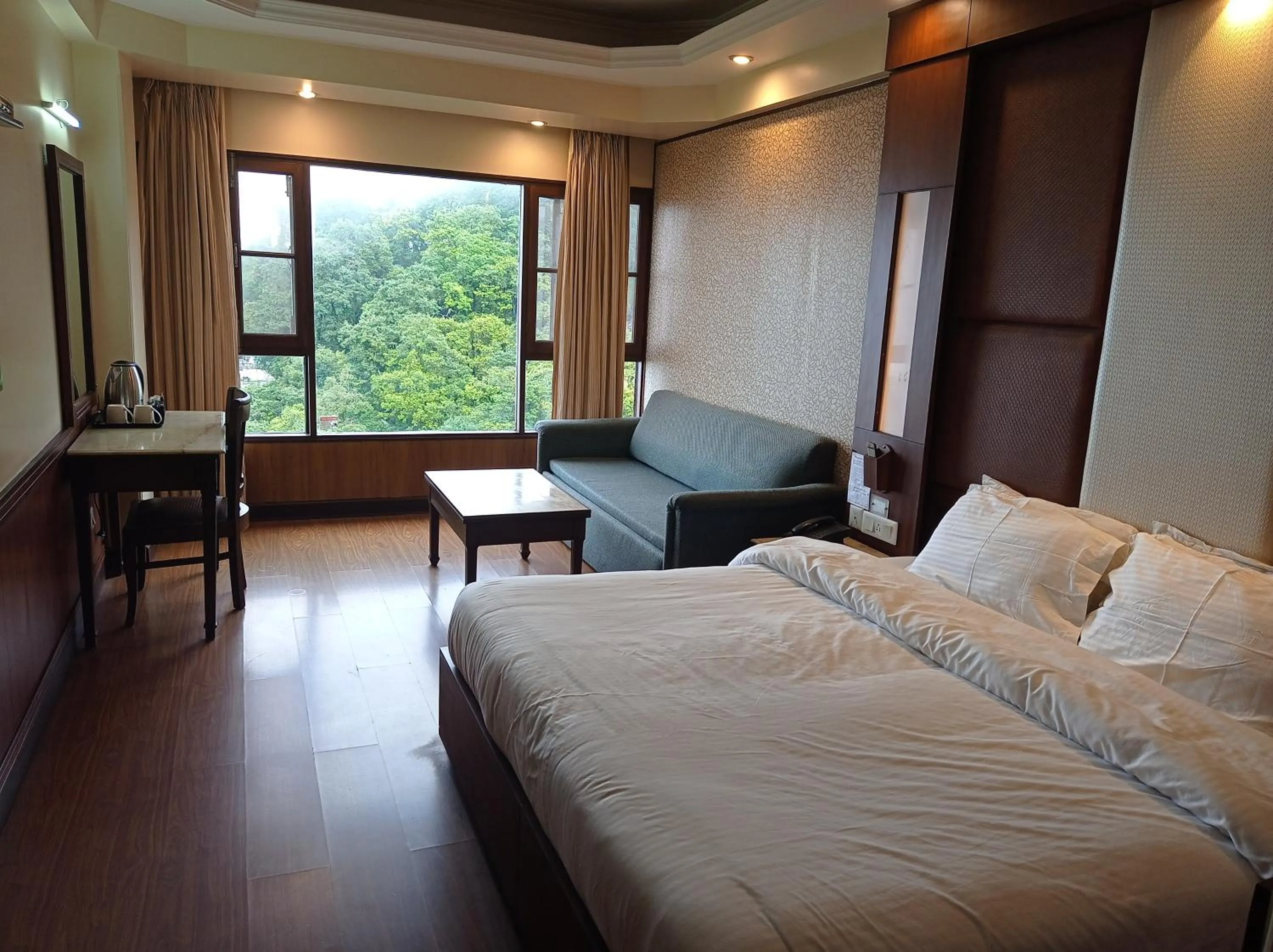 View (from property/room), Bed in Hotel Vishnu Palace