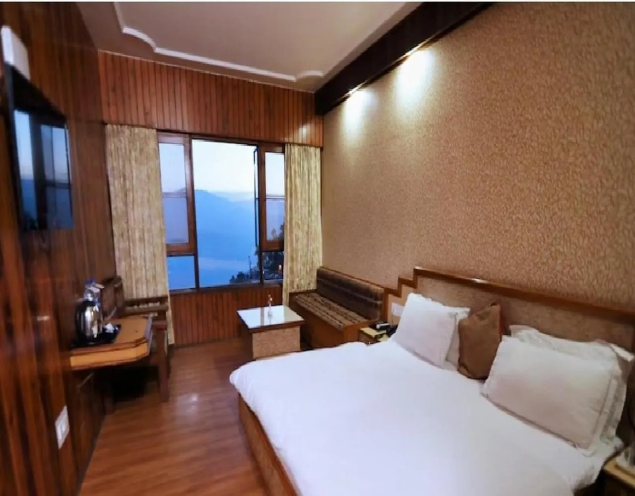 View (from property/room), Bed in Hotel Vishnu Palace